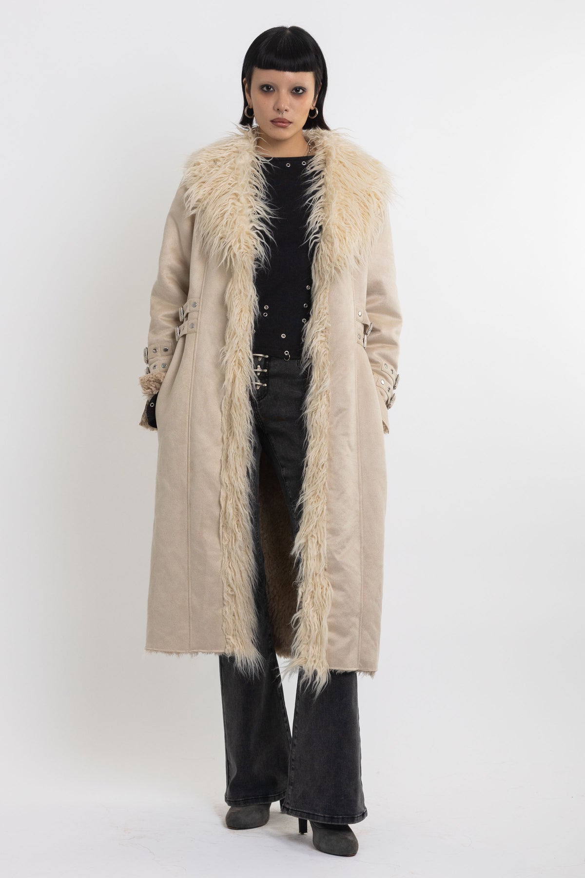 Ecru faux suede and shearling longline afghan penny lane coat with silver eyelet buckles. worn by model
