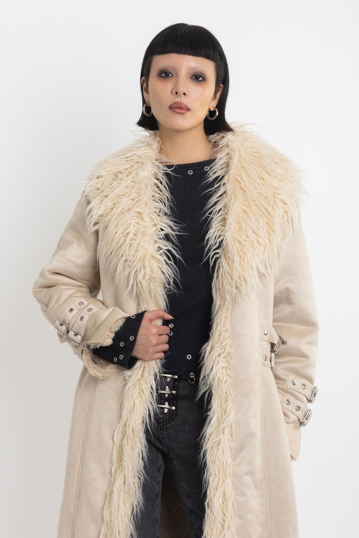 Ecru faux suede and shearling longline afghan penny lane coat with silver eyelet buckles. worn by model