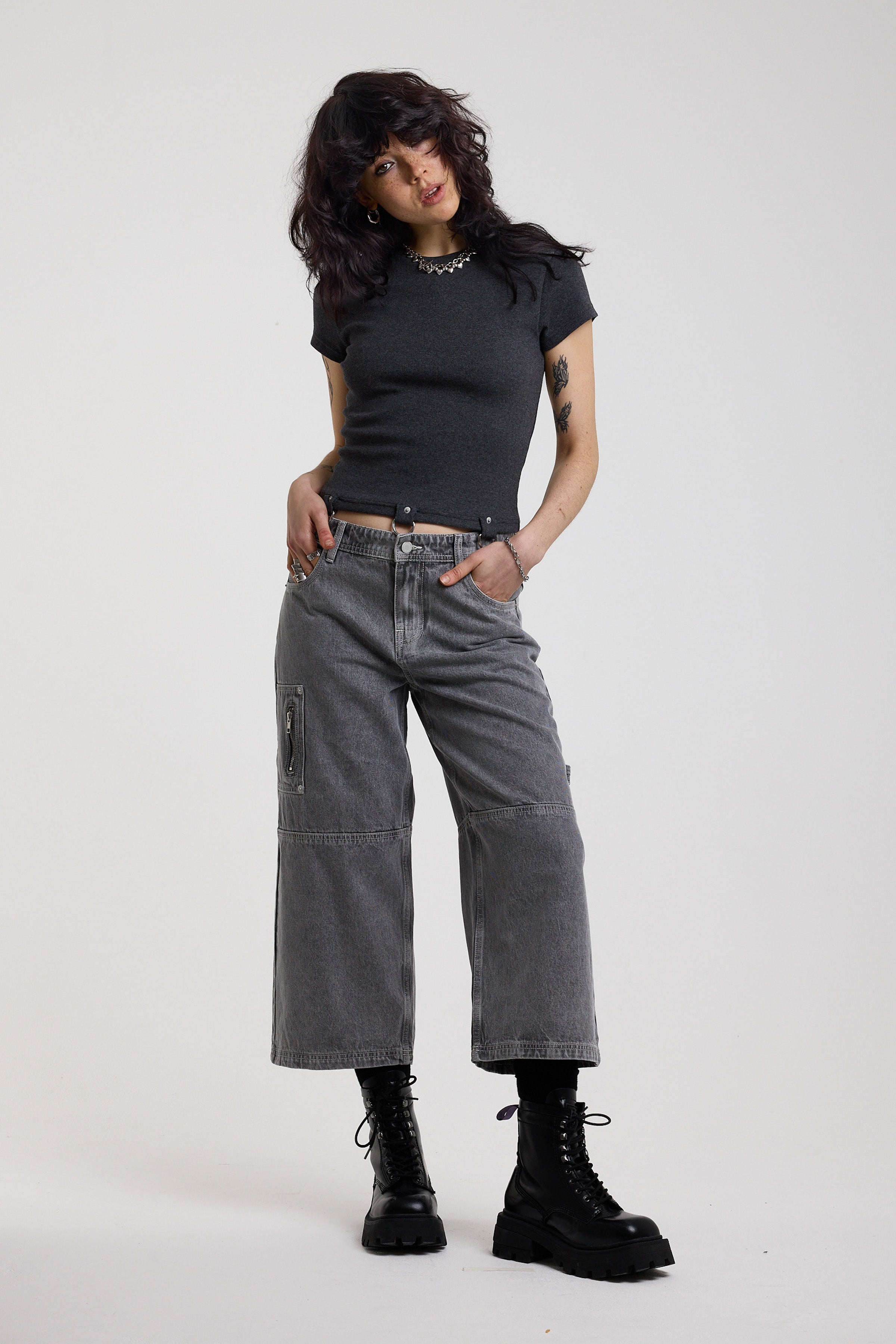 Charcoal ribbed crop t-shirt with silver D-ring hardware detail, worn by model
