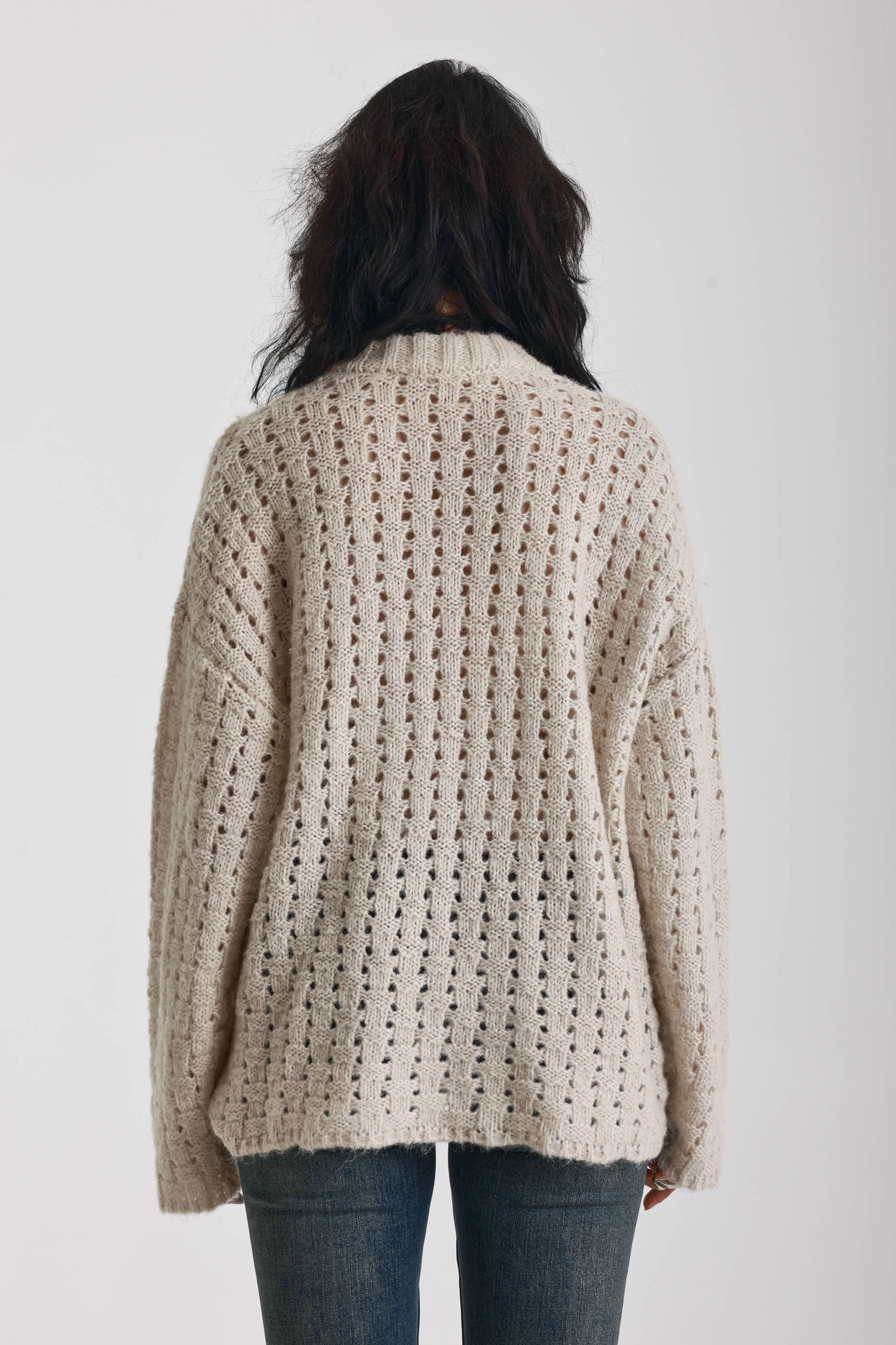 Off white open knit oversized cardigan with zip, worn by model