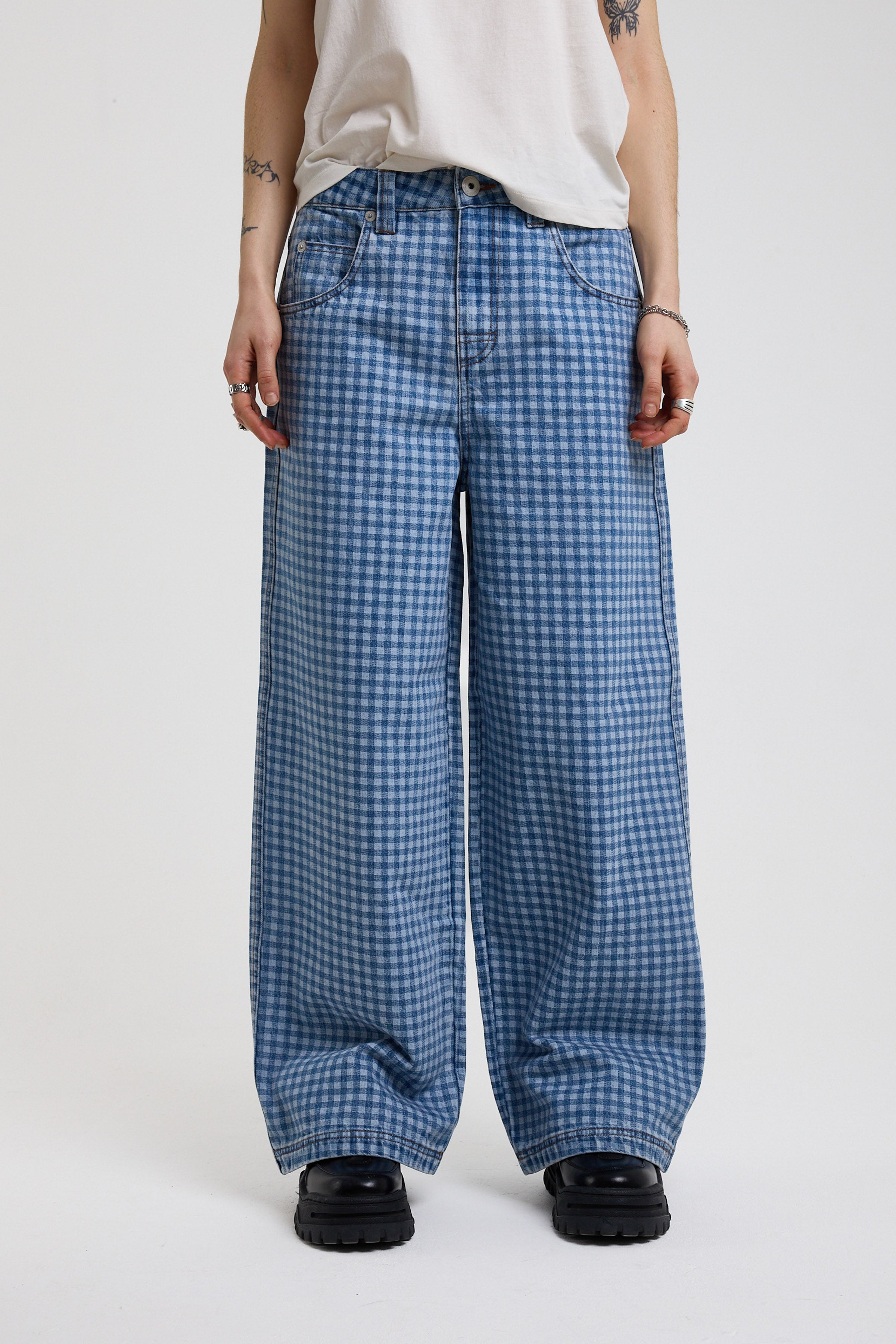 Blue gingham checked baggy wide leg release jeans, worn by model