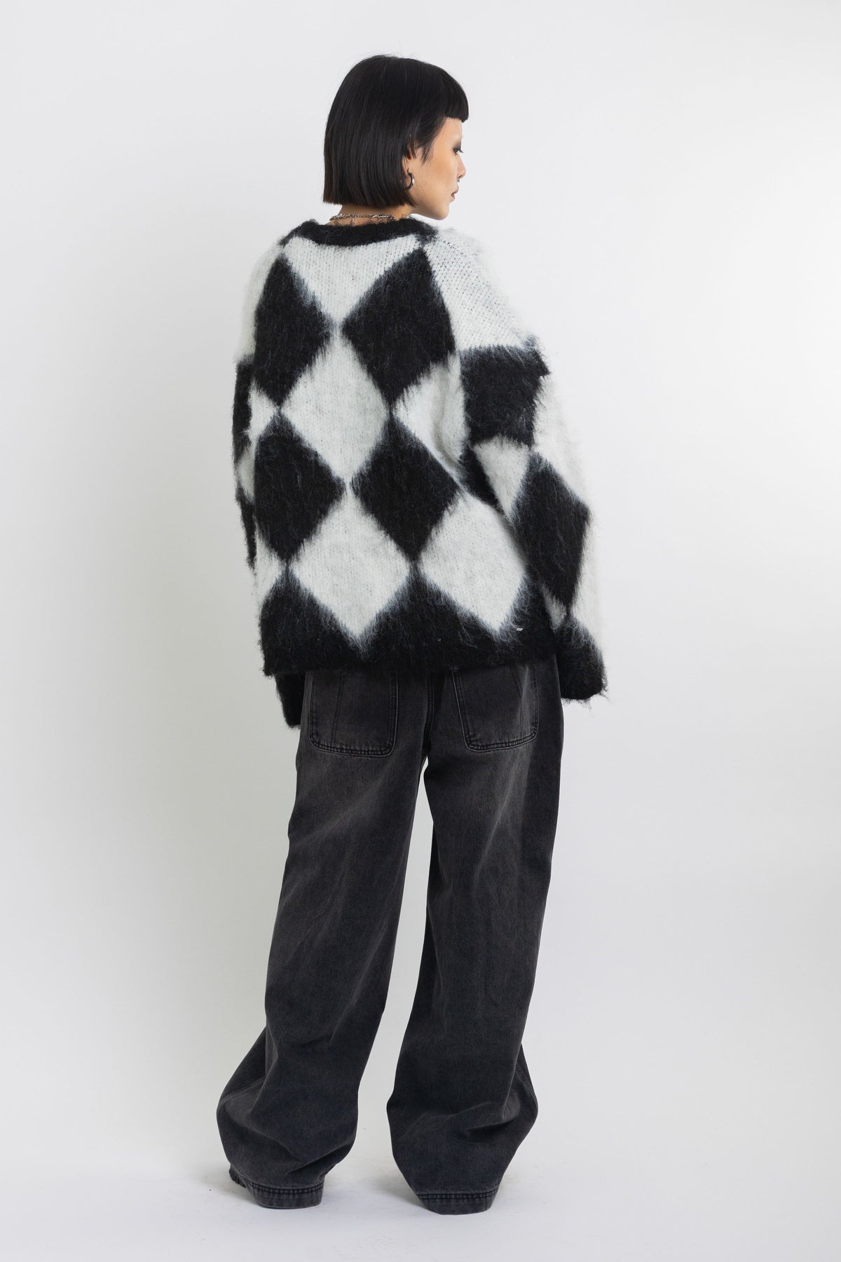 Black and white diamond argyle check fluffy knit oversized jumper, worn by model
