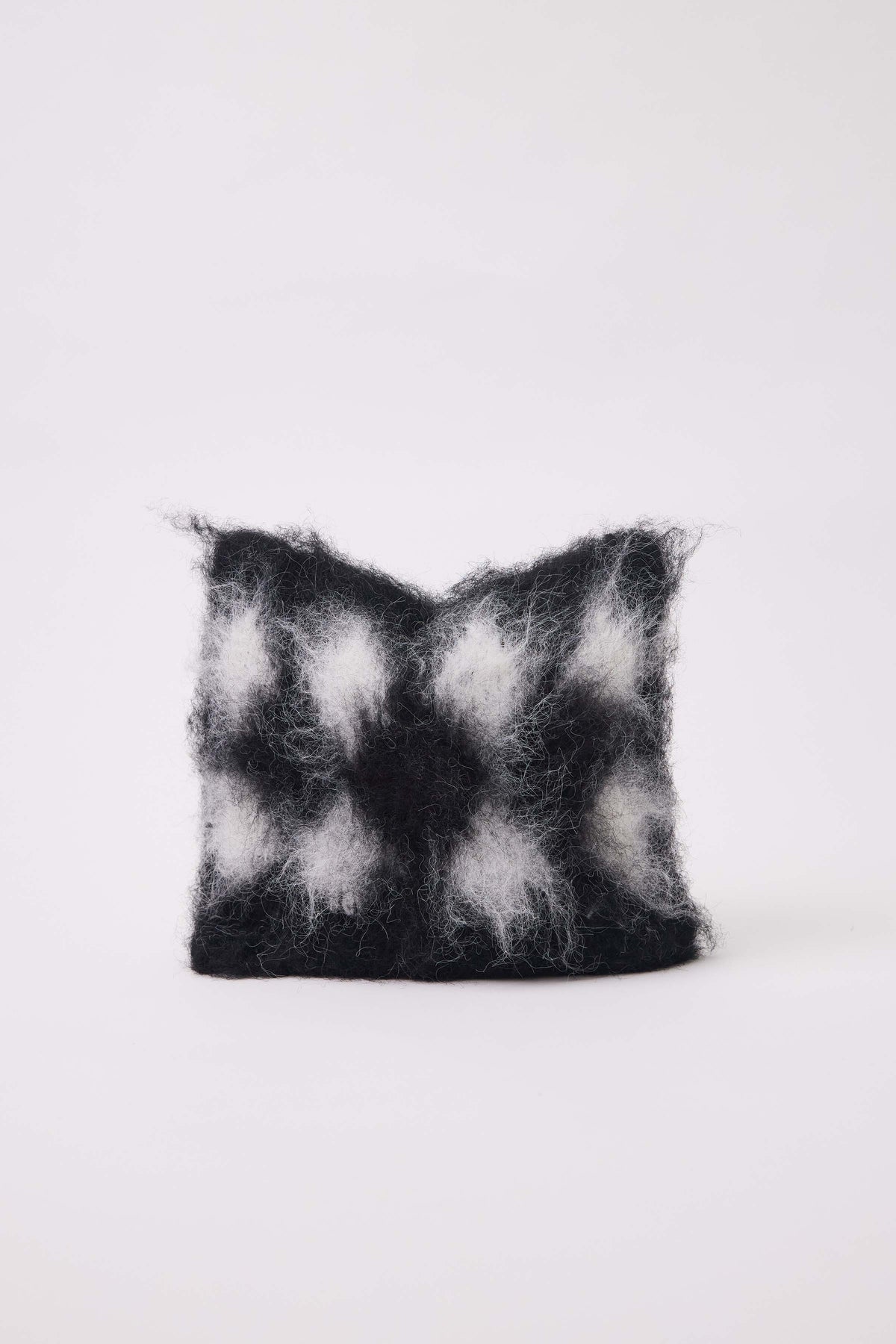 Black and white diamond argyle check knitted beanie with ears.