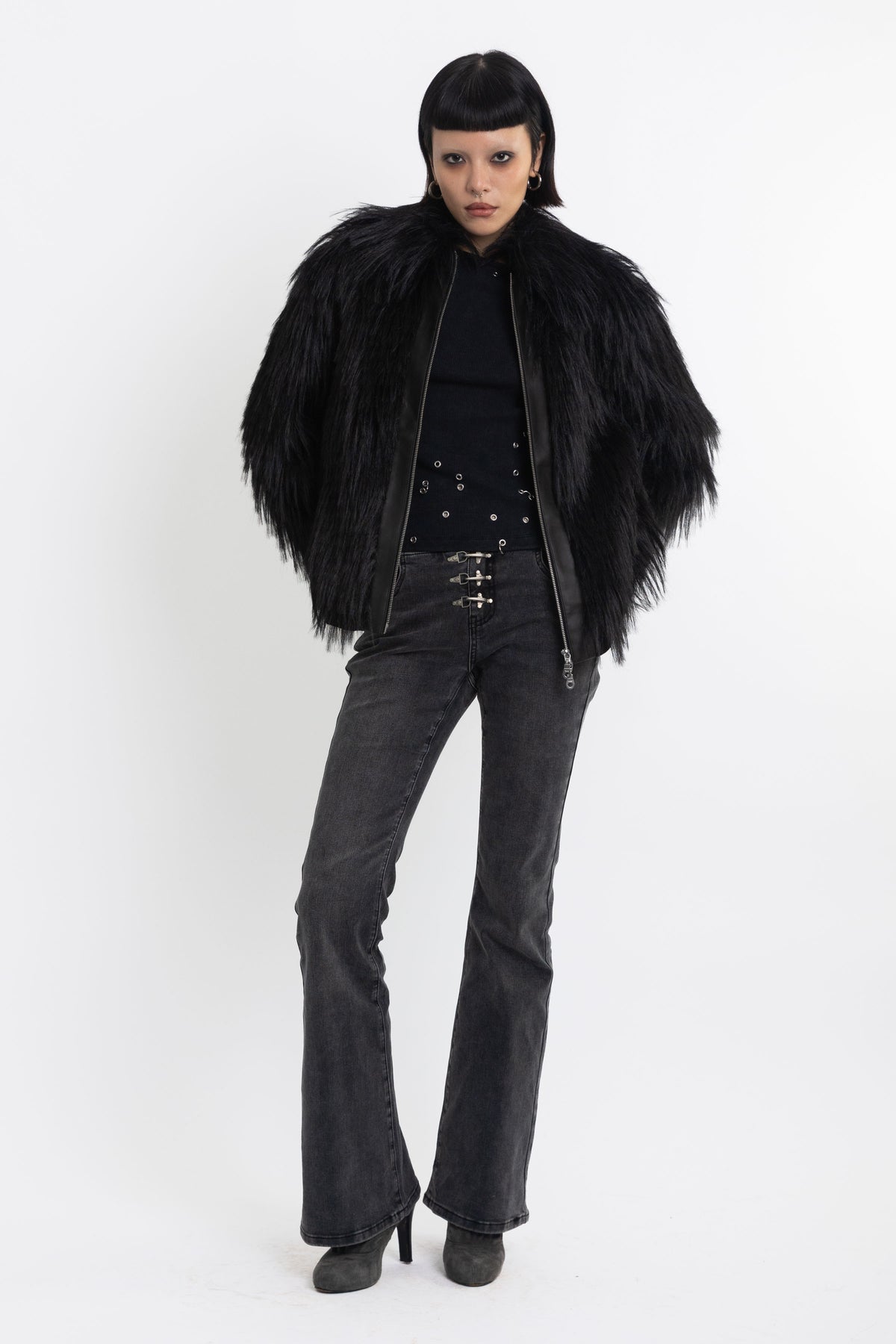 Black shaggy faux fur jacket with pu faux leather panel, worn by model