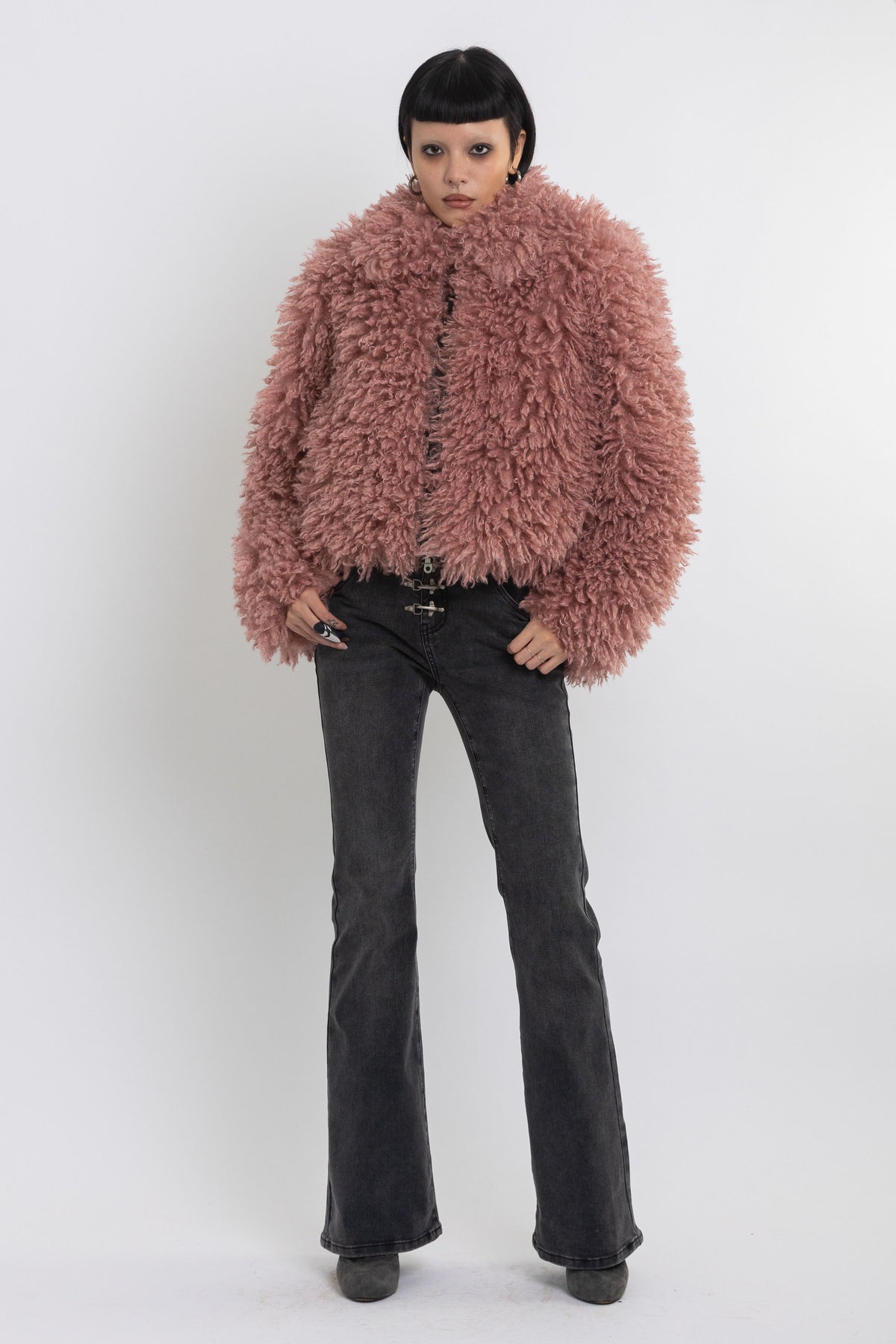 Dusty pink shaggy faux fur jacket with oversized collar and 2-way zip closure, worn by model