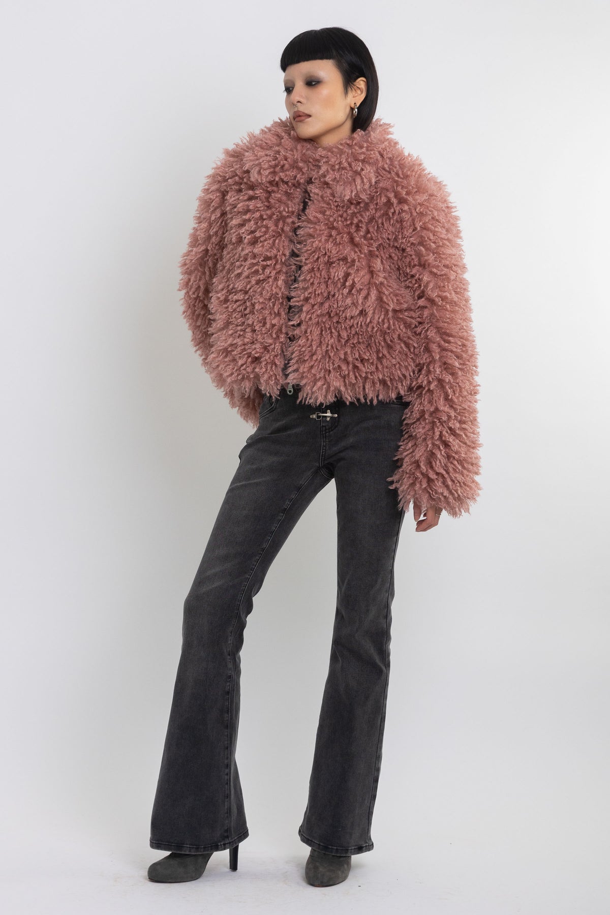 Dusty pink shaggy faux fur jacket with oversized collar and 2-way zip closure, worn by model