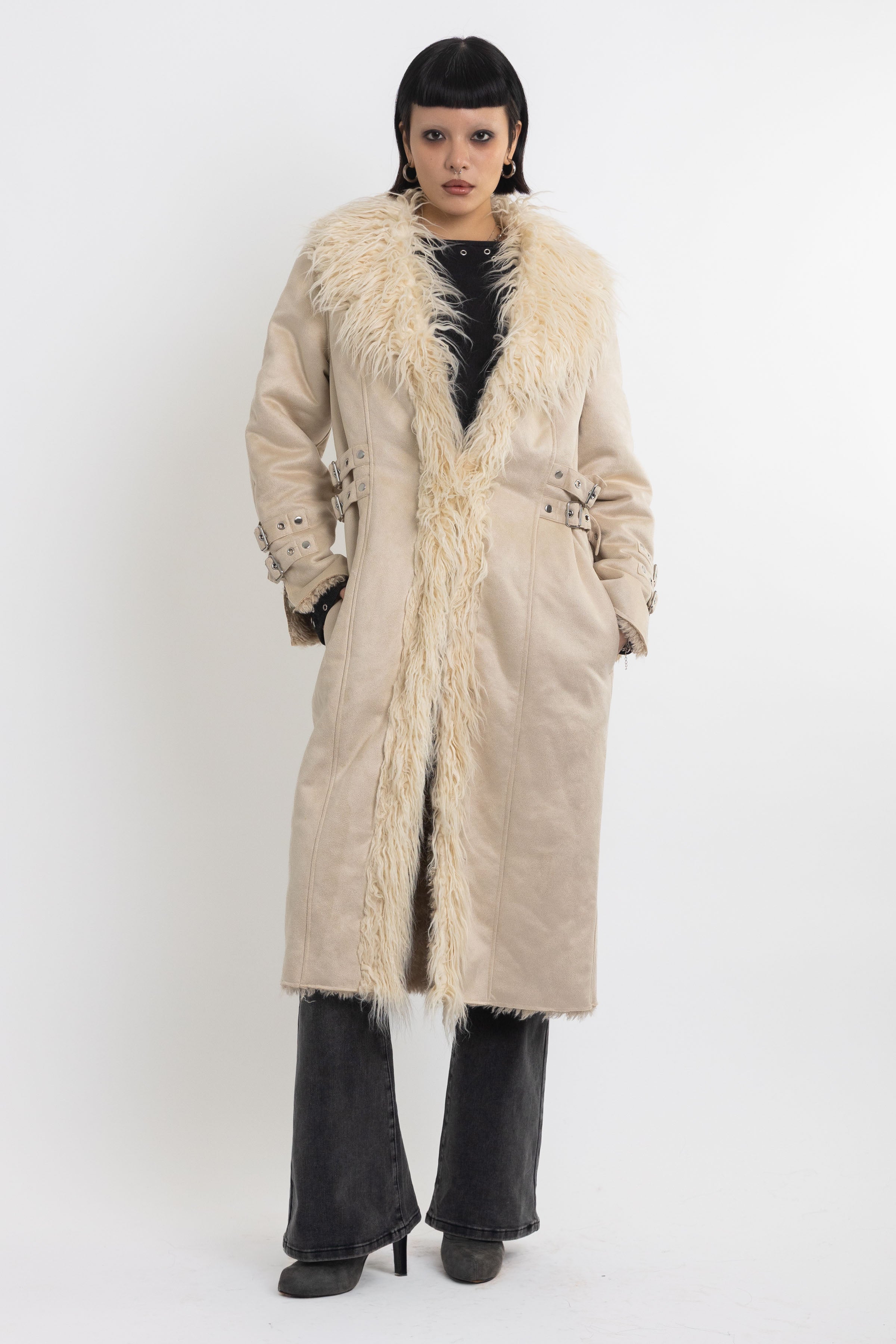 Ecru faux suede and shearling longline afghan penny lane coat with silver eyelet buckles. worn by model 