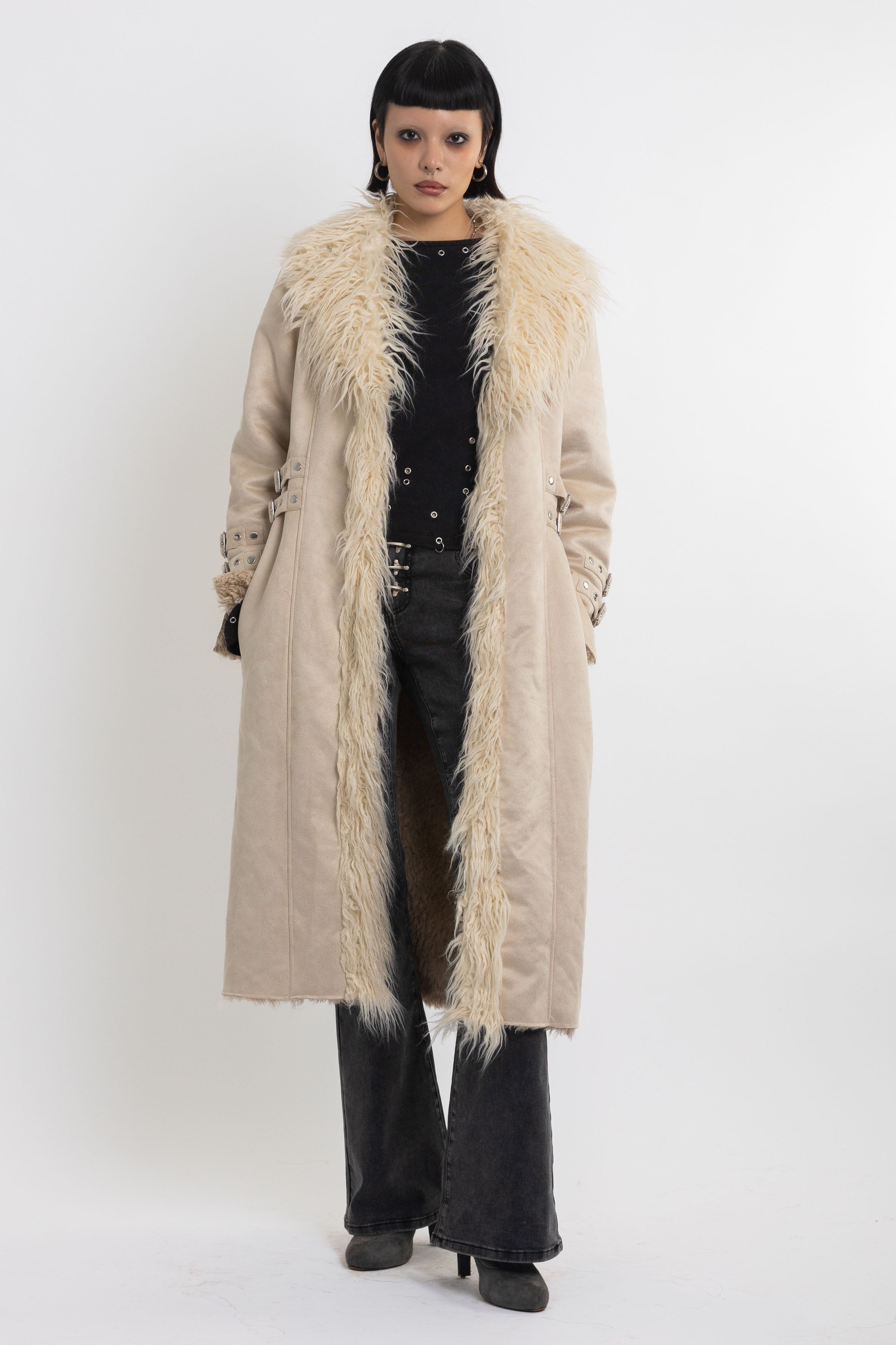 Ecru faux suede and shearling longline afghan penny lane coat with silver eyelet buckles. worn by model 