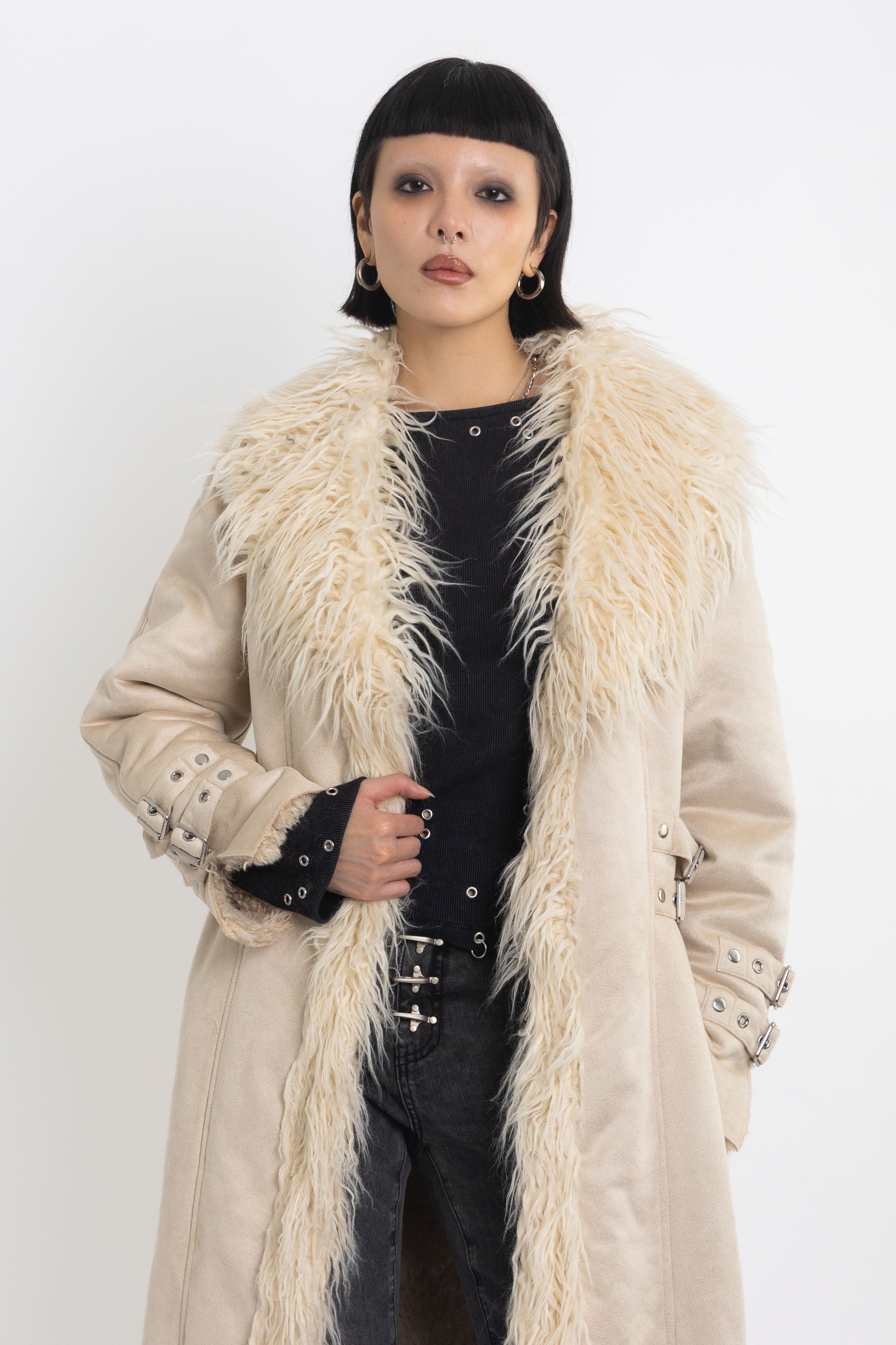 Ecru faux suede and shearling longline afghan penny lane coat with silver eyelet buckles. worn by model 