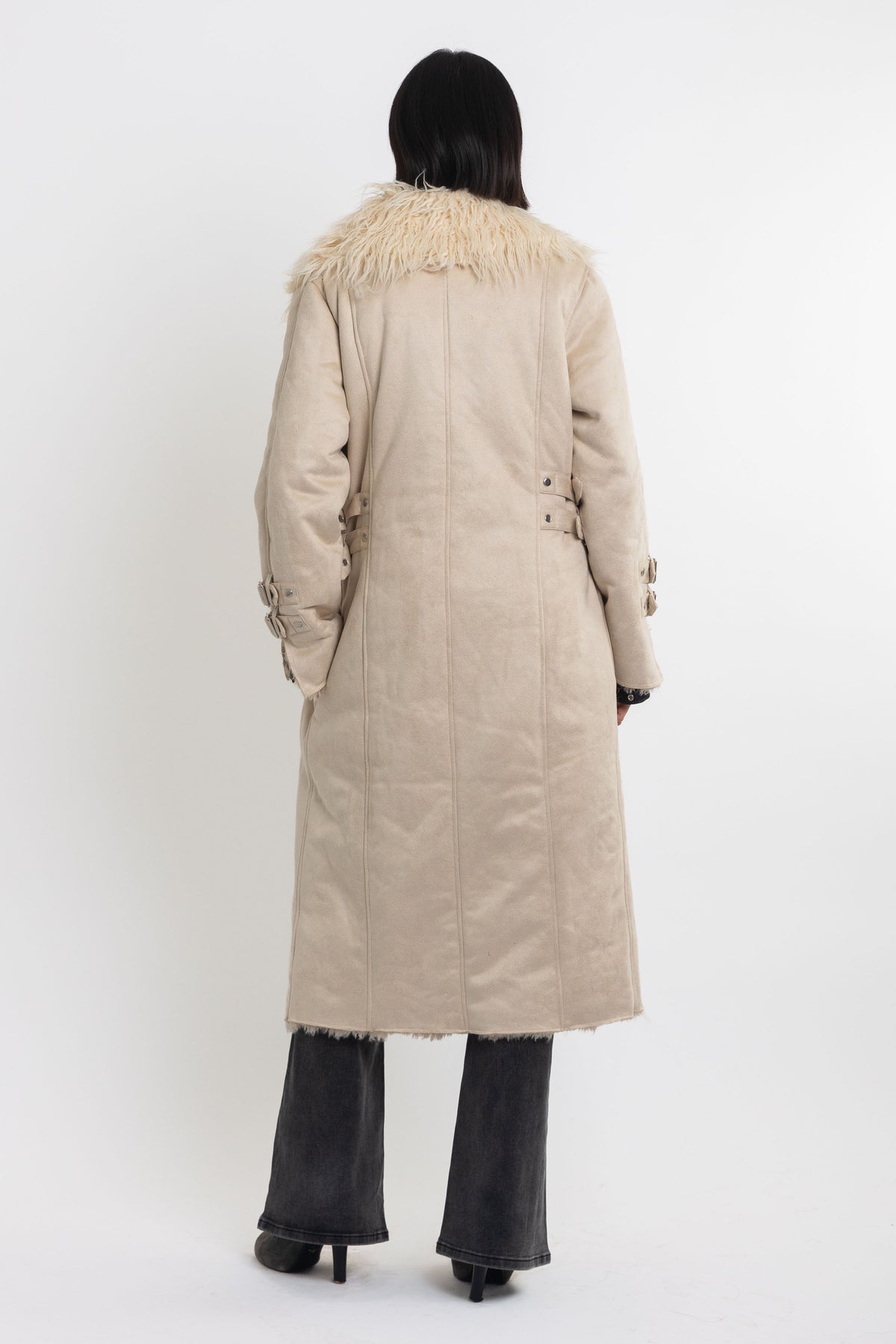 Ecru faux suede and shearling longline afghan penny lane coat with silver eyelet buckles. worn by model 