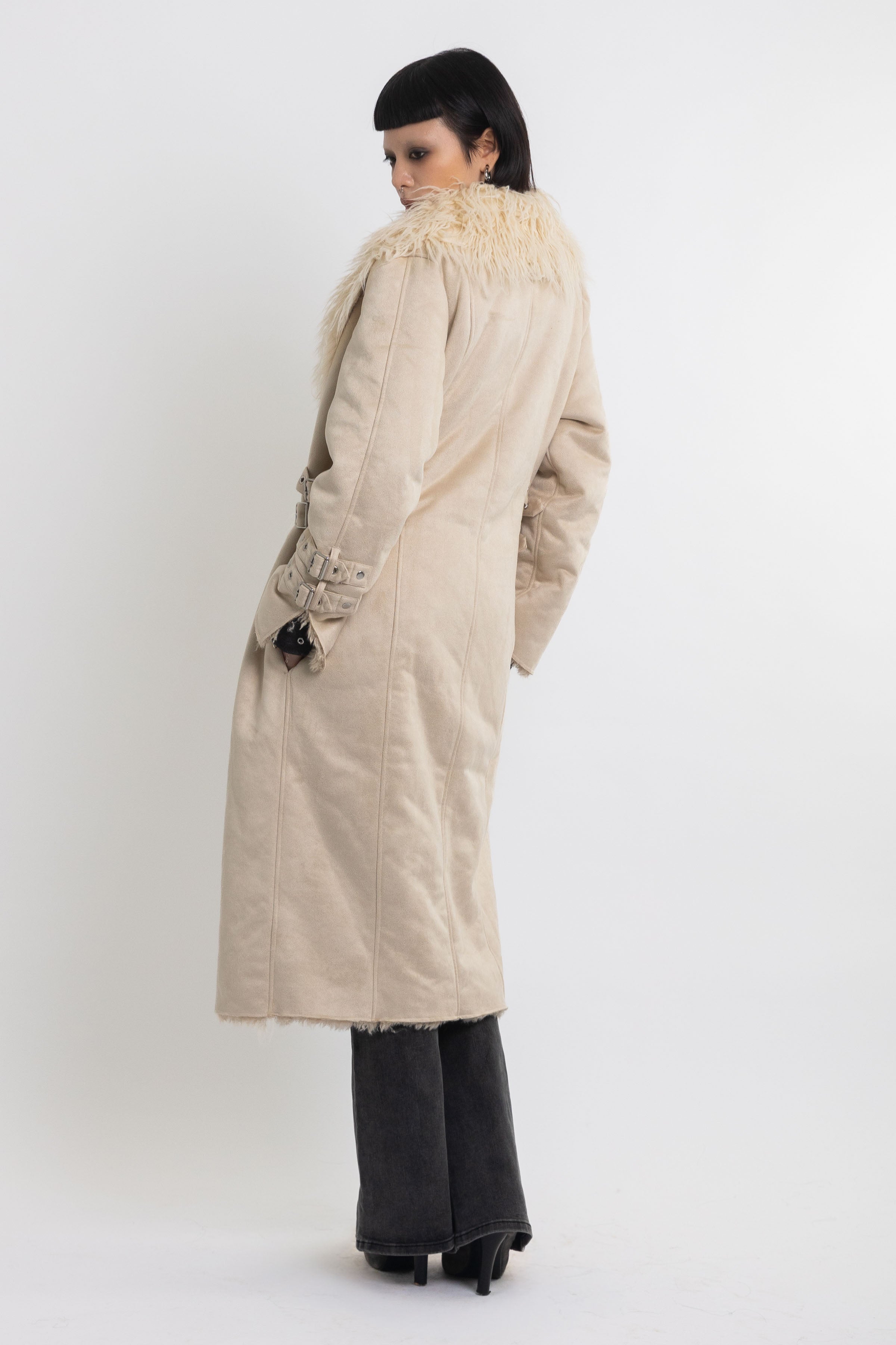 Ecru faux suede and shearling longline afghan penny lane coat with silver eyelet buckles. worn by model 