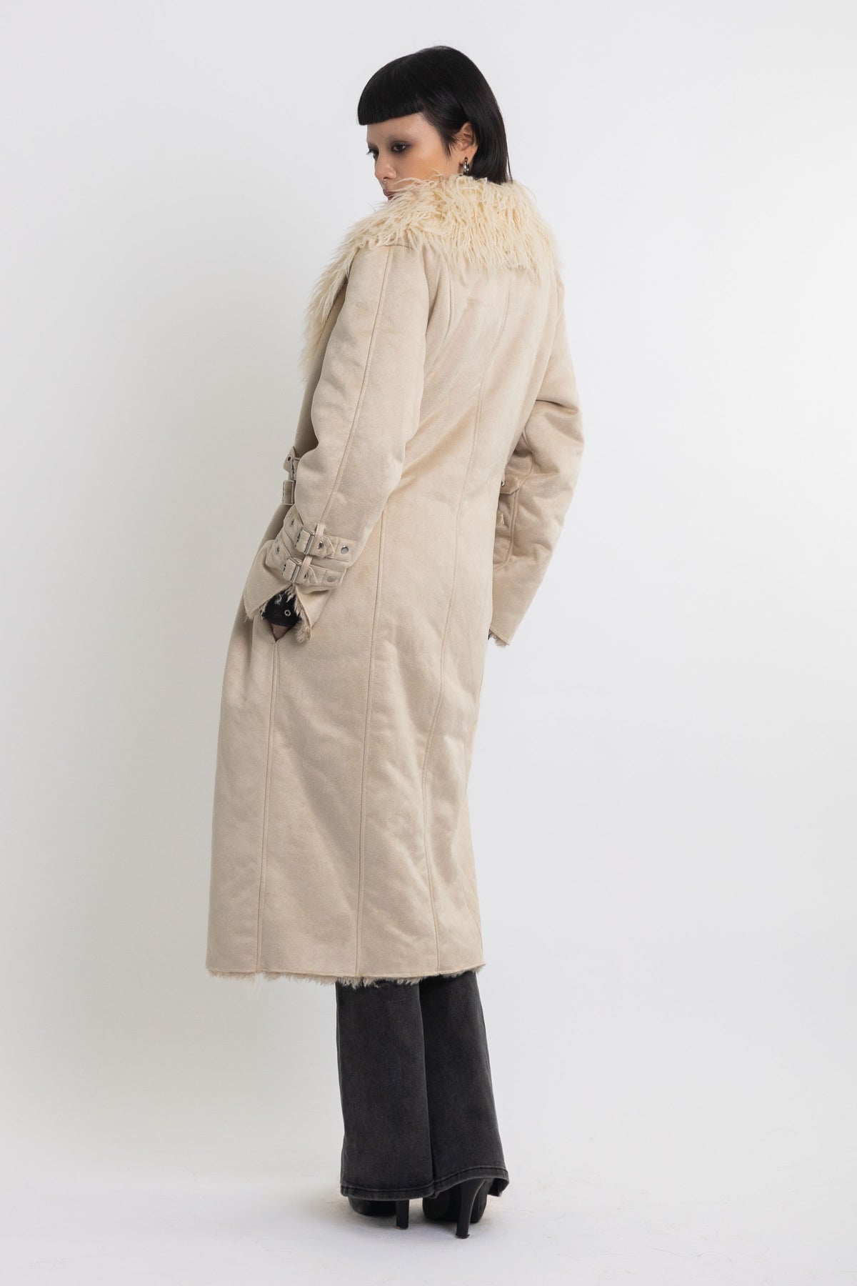 Ecru faux suede and shearling longline afghan penny lane coat with silver eyelet buckles. worn by model 