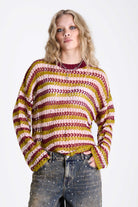 Pink and green contrast stripe crochet open knit oversized jumper, worn by model