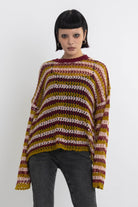 Grunge striped crochet open knit jumper, worn by model