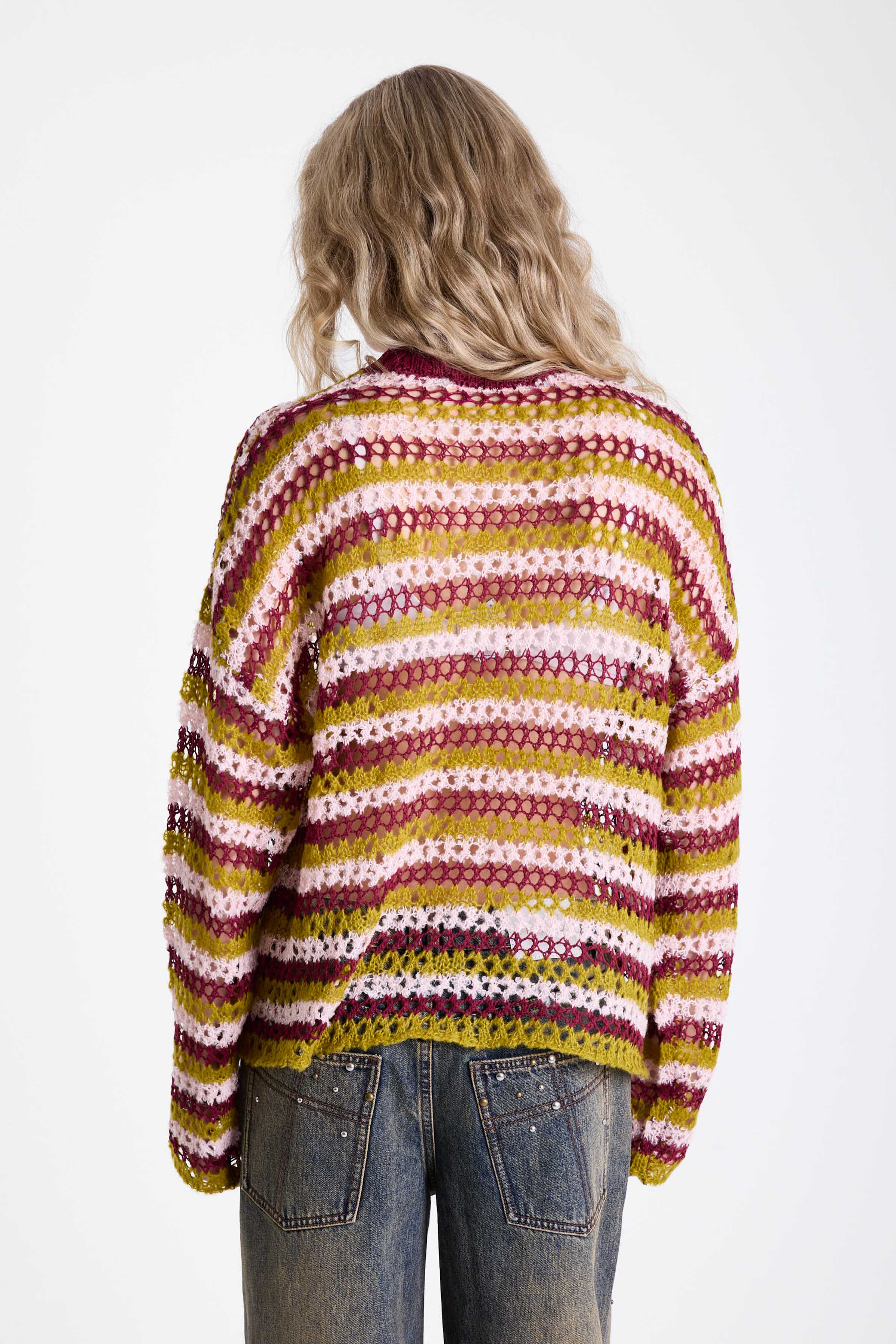 Pink and green contrast stripe crochet open knit oversized jumper, worn by model