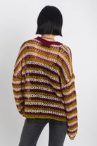 Grunge striped crochet open knit jumper, worn by model