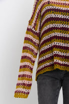 Grunge striped crochet open knit jumper, worn by model