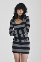 Black and grey stripe hooded mini dress with eyelet belt, worn by model