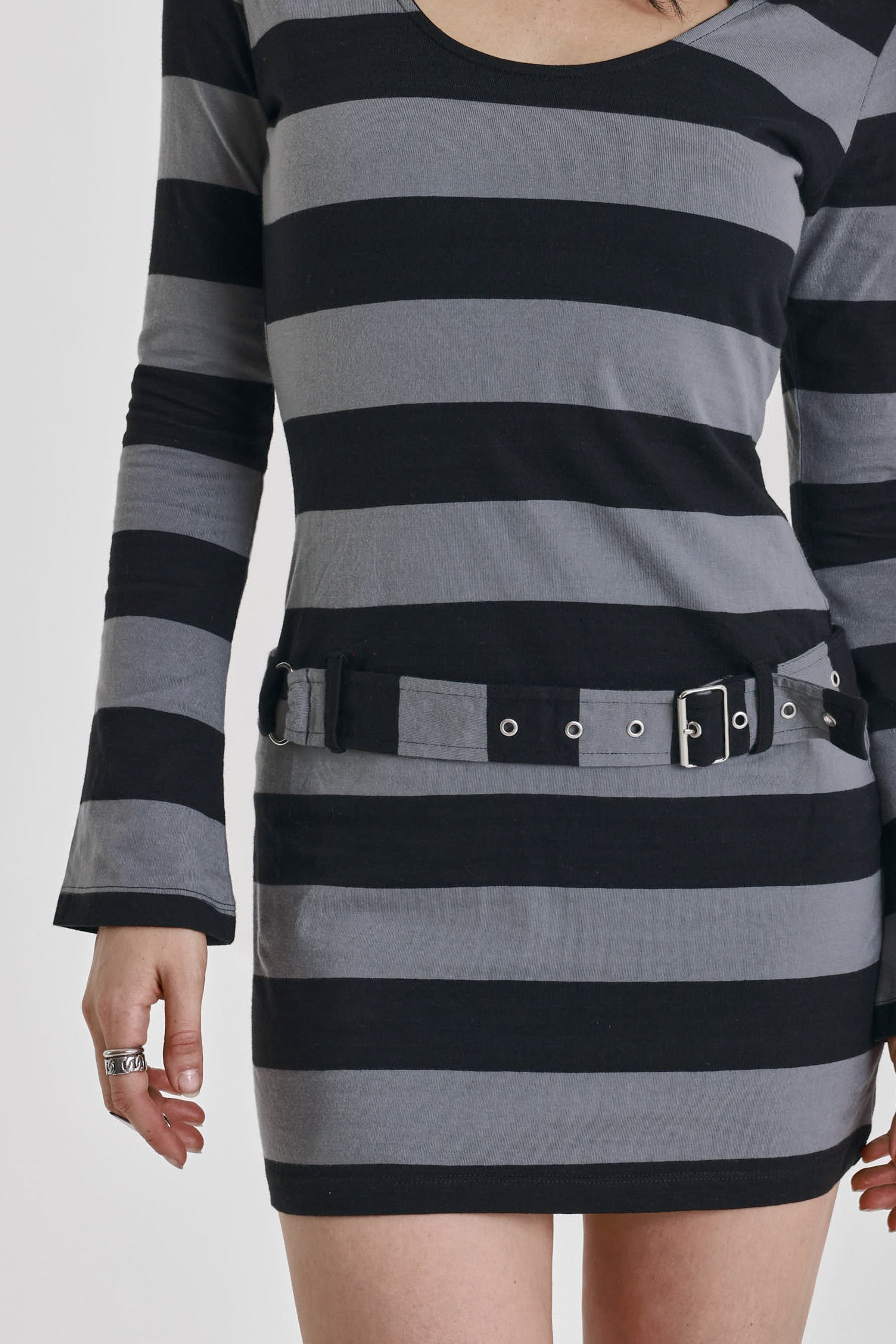 Black and grey stripe hooded mini dress with eyelet belt, worn by model