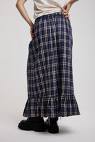 Back image of blue and yellow check  maxi skirt with peplum hem, worn by model