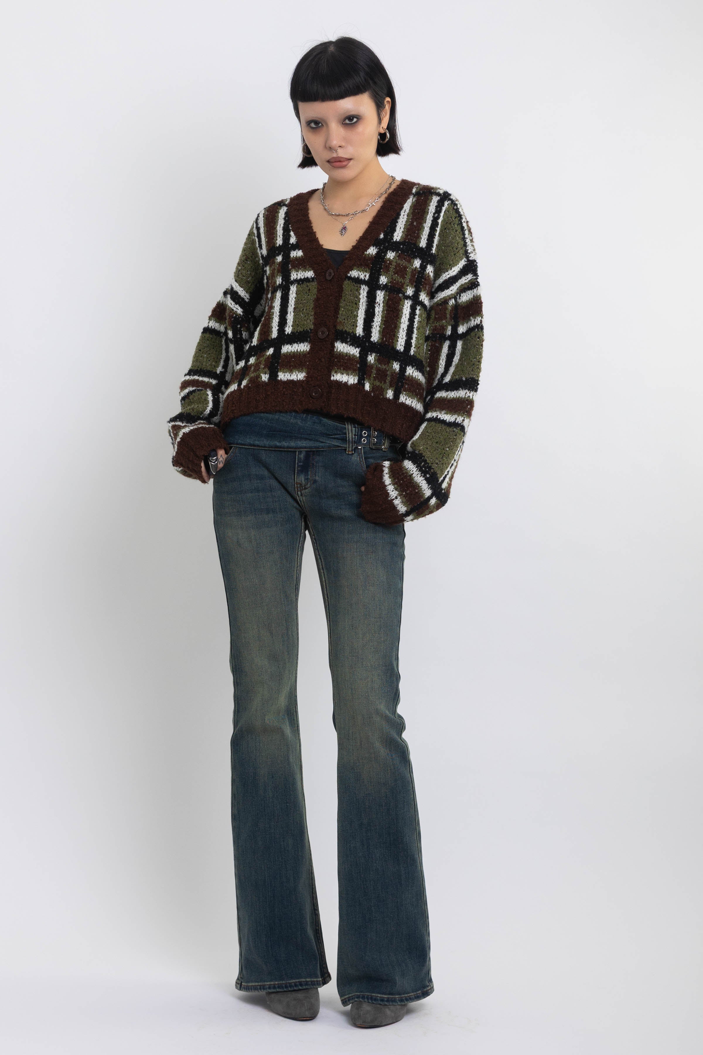 Brown and khaki grunge check boucle knit cardigan with v-neck, worn by model