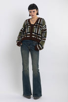 Brown and khaki grunge check boucle knit cardigan with v-neck, worn by model