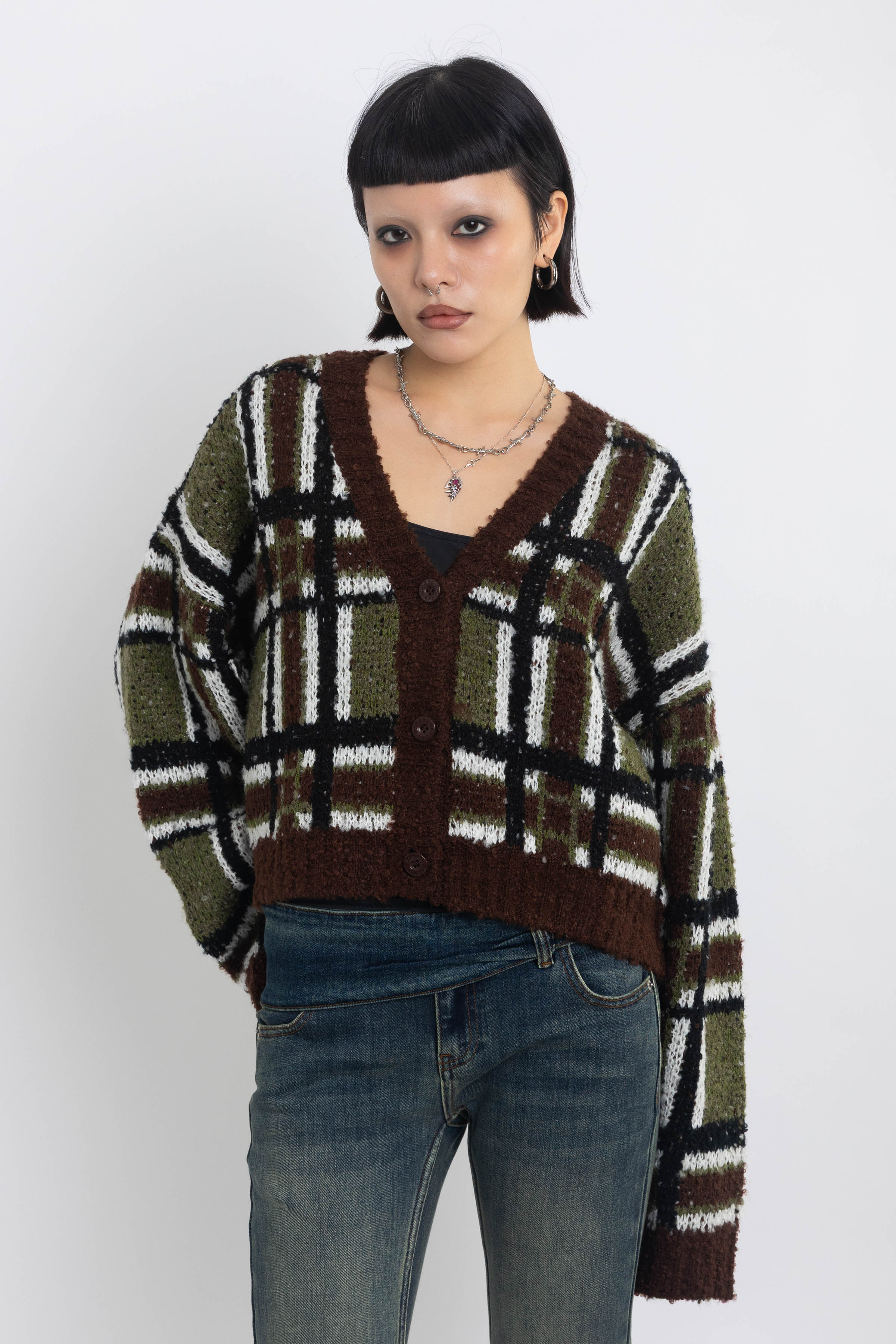 Brown and khaki grunge check boucle knit cardigan with v-neck, worn by model