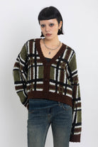 Brown and khaki grunge check boucle knit cardigan with v-neck, worn by model