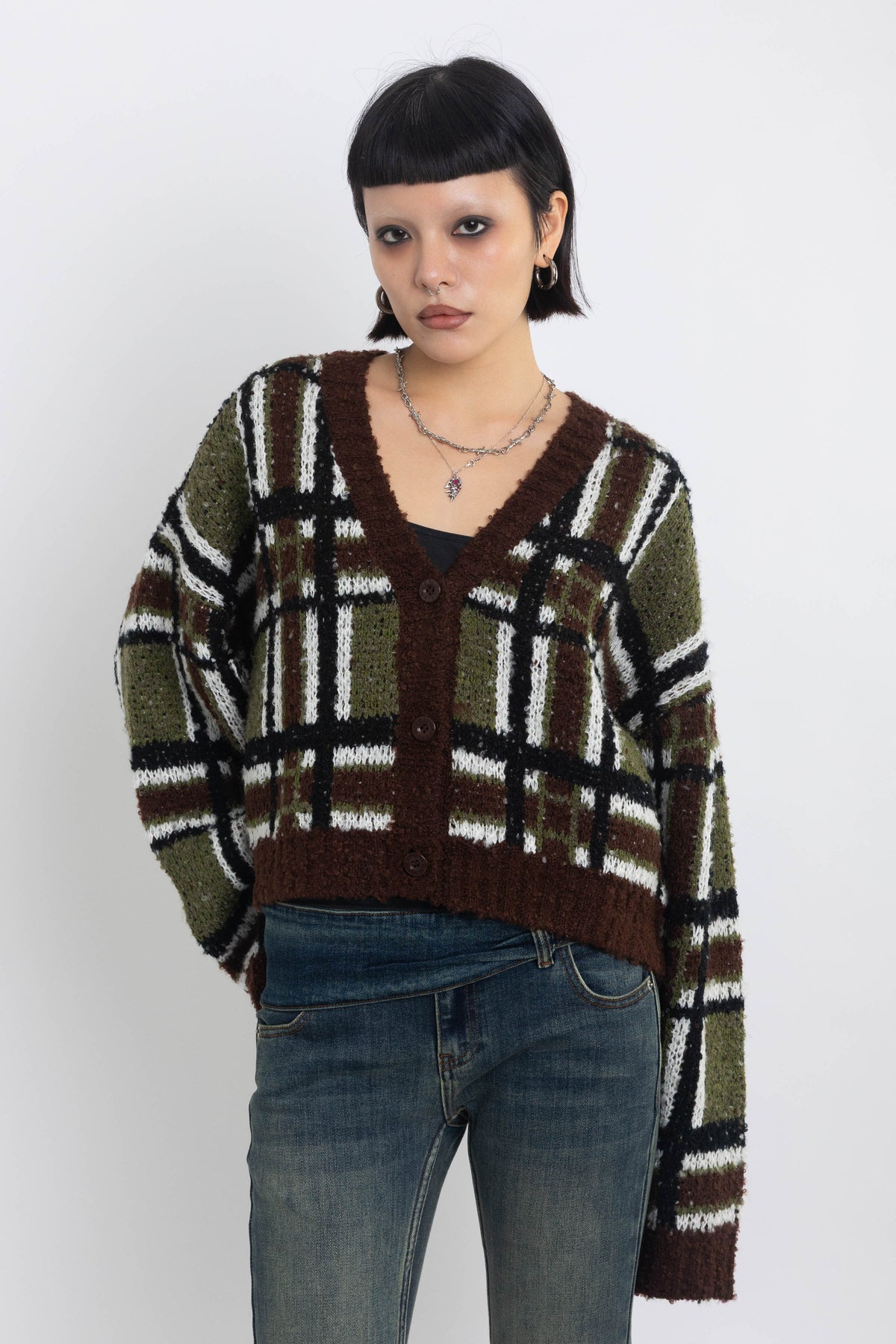 Brown and khaki grunge check boucle knit cardigan with v-neck, worn by model