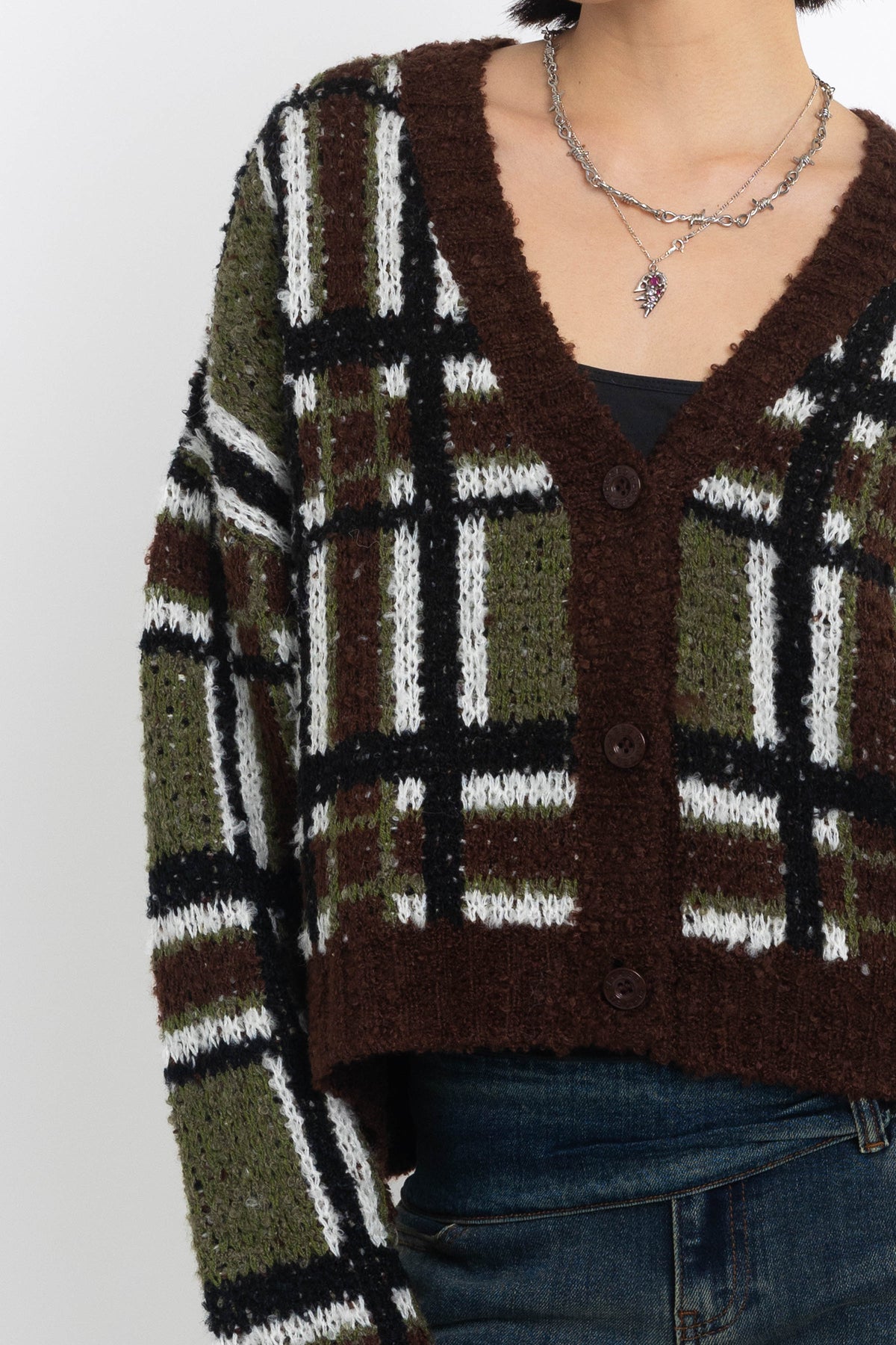 Brown and khaki grunge check boucle knit cardigan with v-neck, worn by model