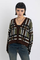 Brown and khaki grunge check boucle knit cardigan with v-neck, worn by model