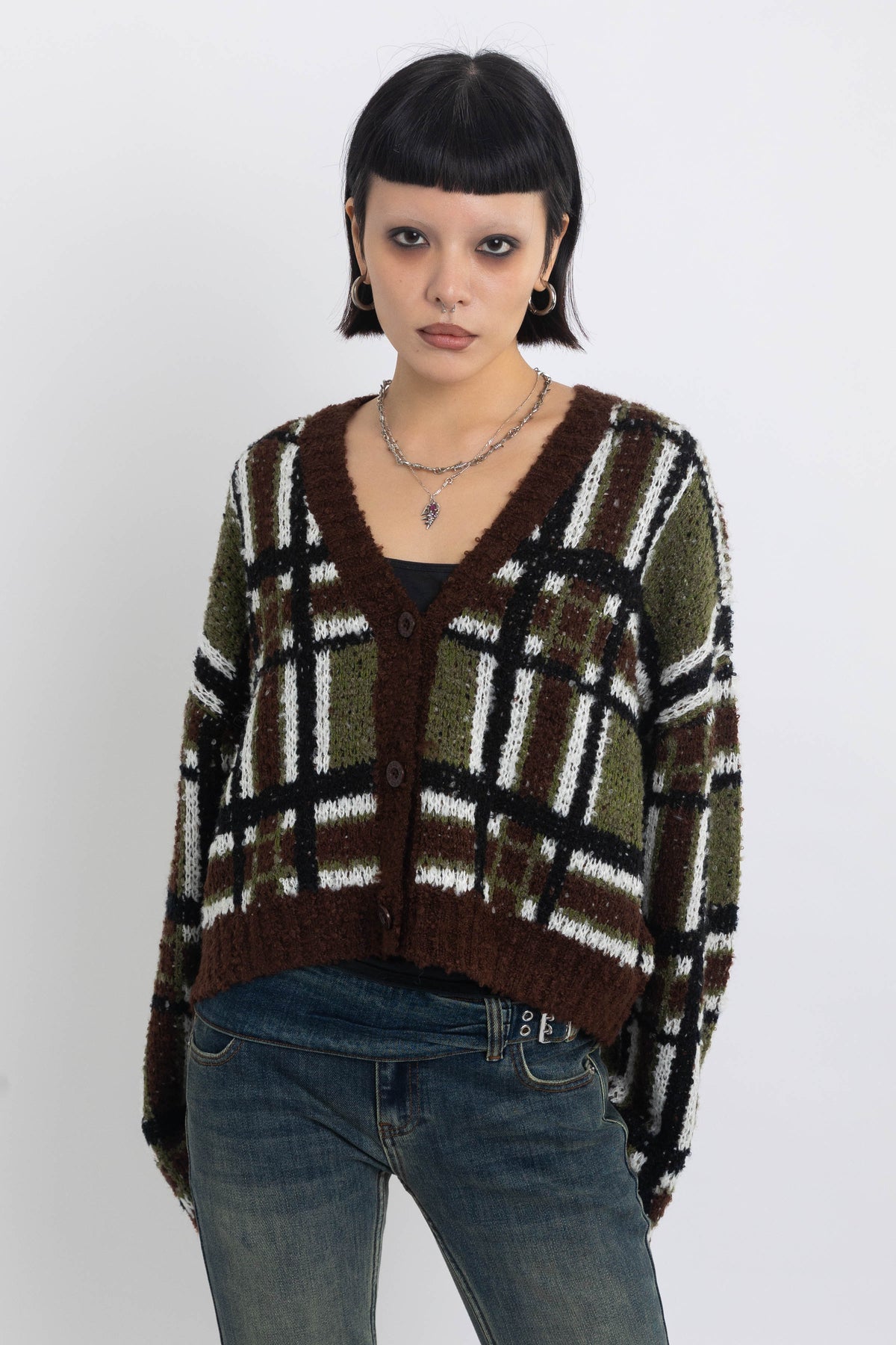Brown and khaki grunge check boucle knit cardigan with v-neck, worn by model