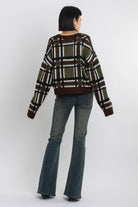 Brown and khaki grunge check boucle knit cardigan with v-neck, worn by model
