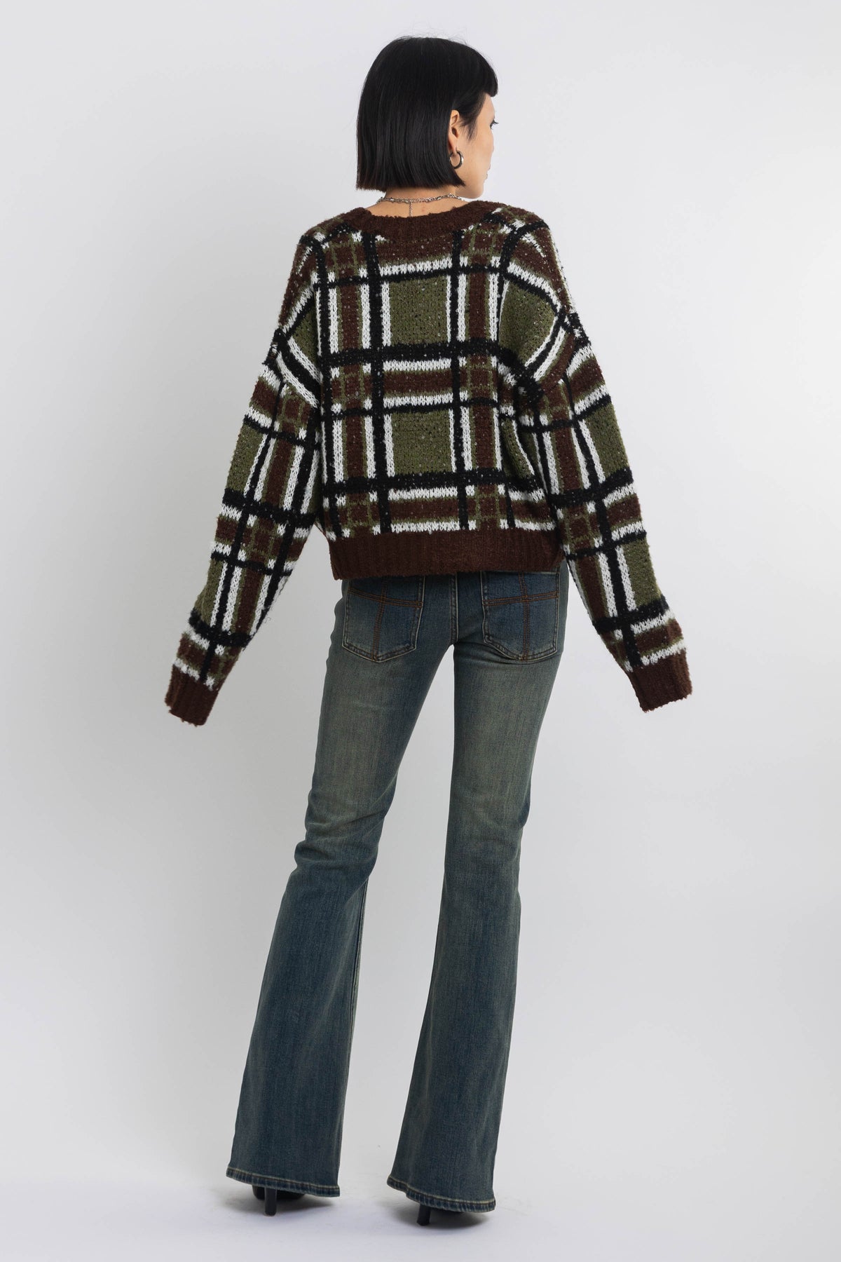 Brown and khaki grunge check boucle knit cardigan with v-neck, worn by model