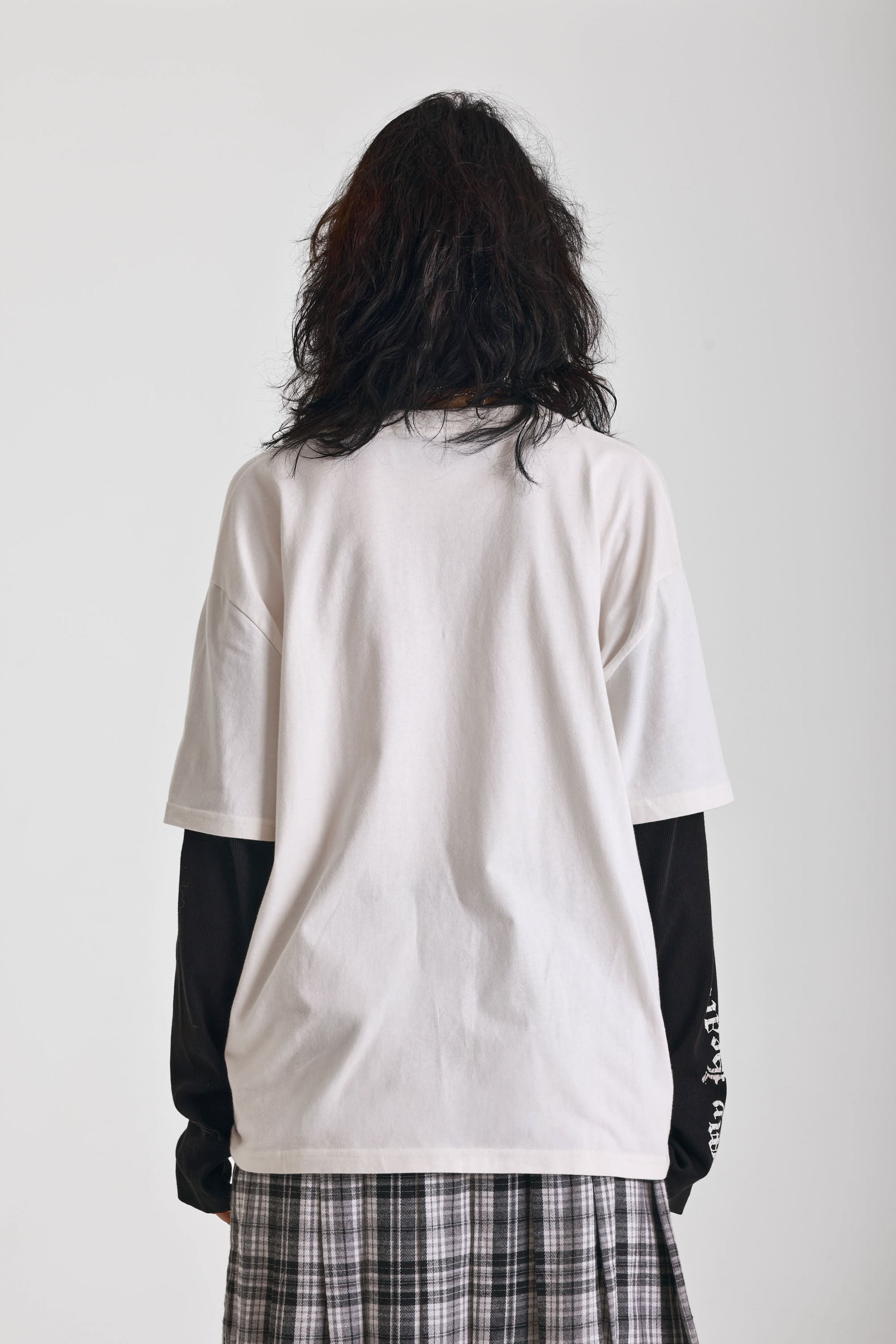 Ecru long sleeve skate t-shirt with screen printed grunge thorn heart print, worn by model
