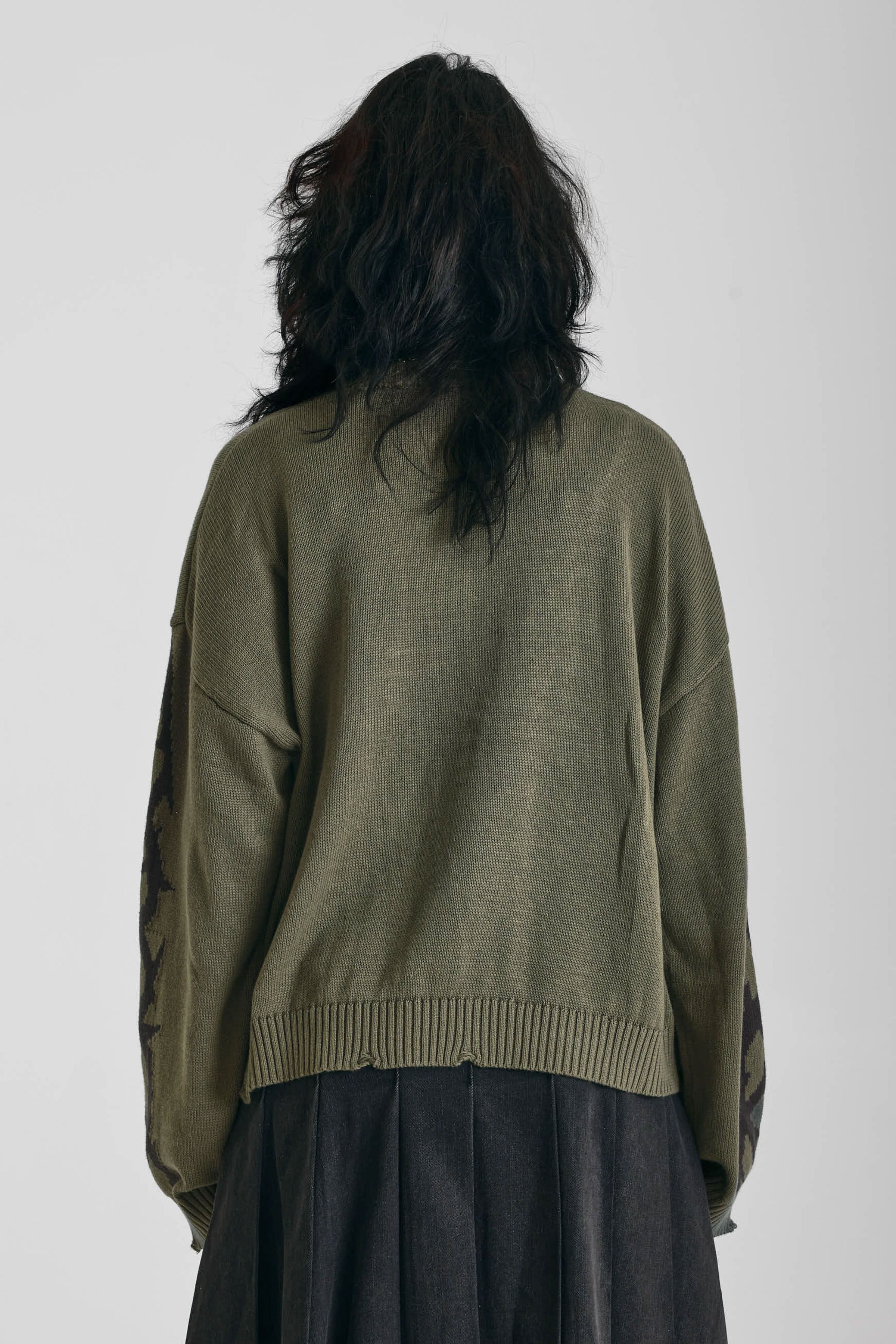 Washed khaki oversized knit jumper with black barbed wire tattoo graphic, worn by model