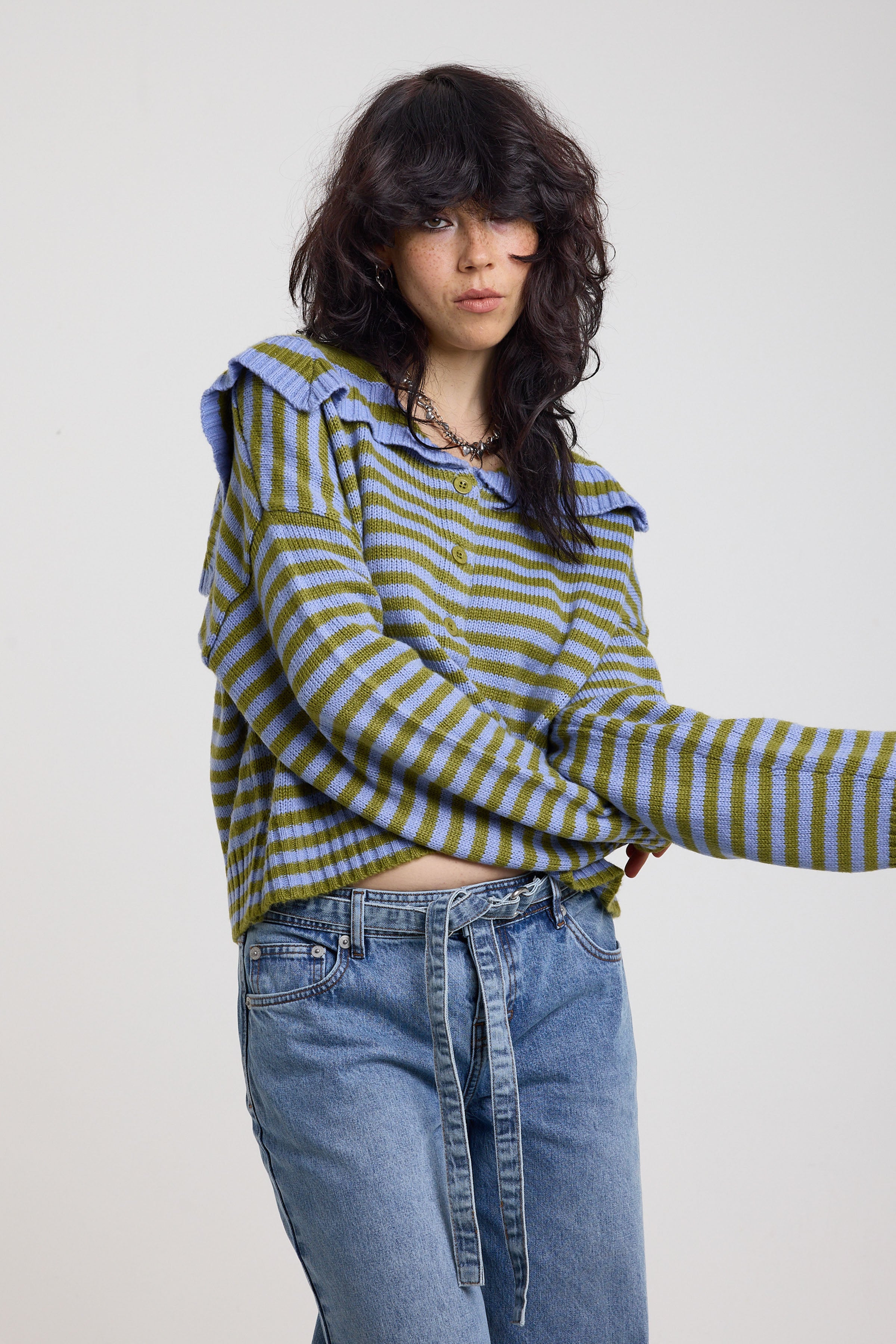 Blue and green stripe knit cardigan with oversized collar, worn by a model