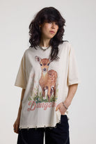 Off-white oversized t-shirt with graphic deer print and silver O-ring hardware detail, worn by model