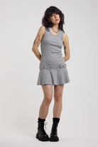 Grey mini dress with silver stud detail and eyelet detail belt, worn by model