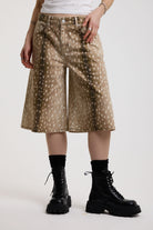 Baggy wide leg jorts in all over deer print, worn by model