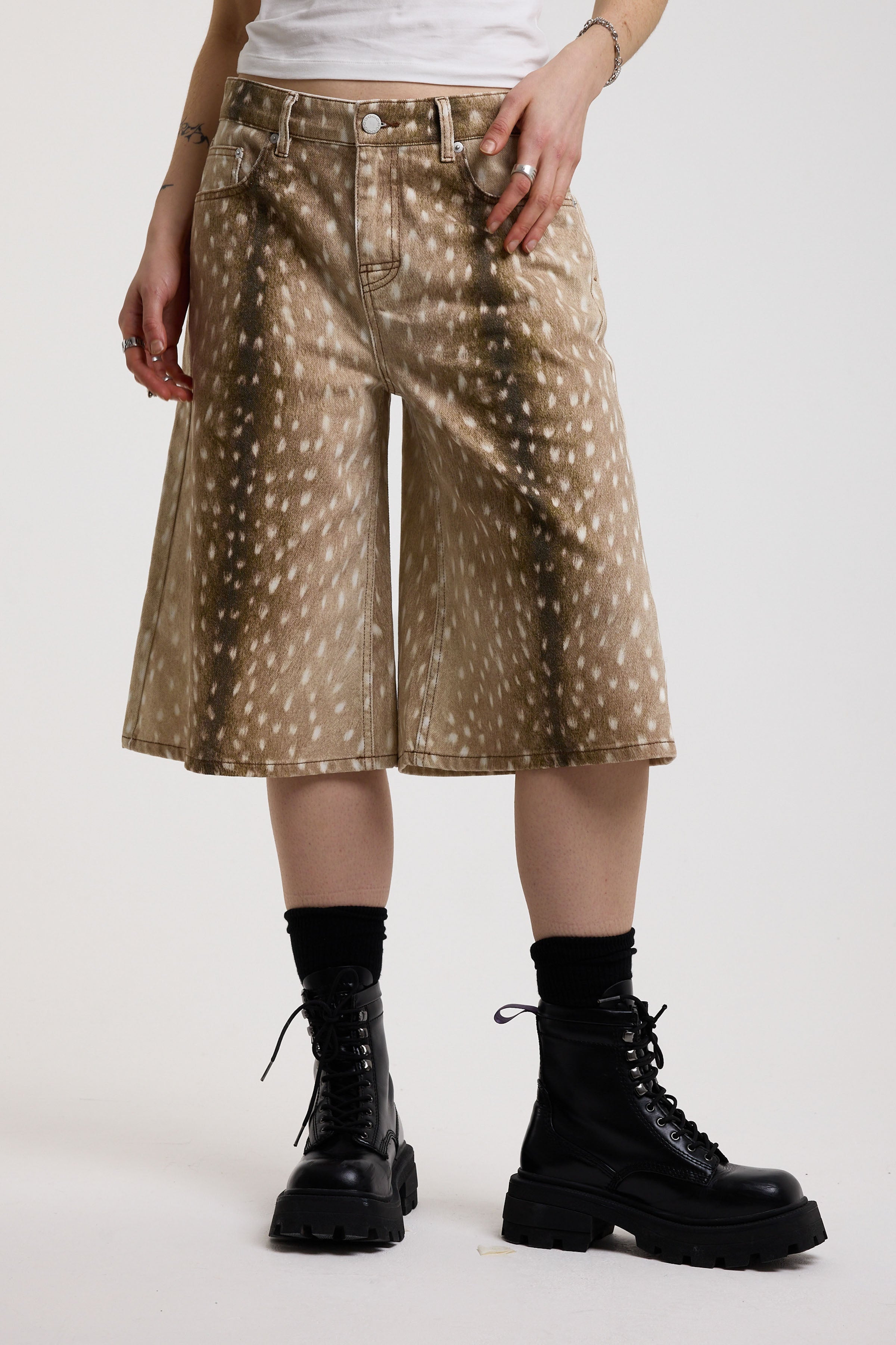 Baggy wide leg jorts in all over deer print, worn by model
