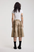 Baggy wide leg jorts in all over deer print, worn by model