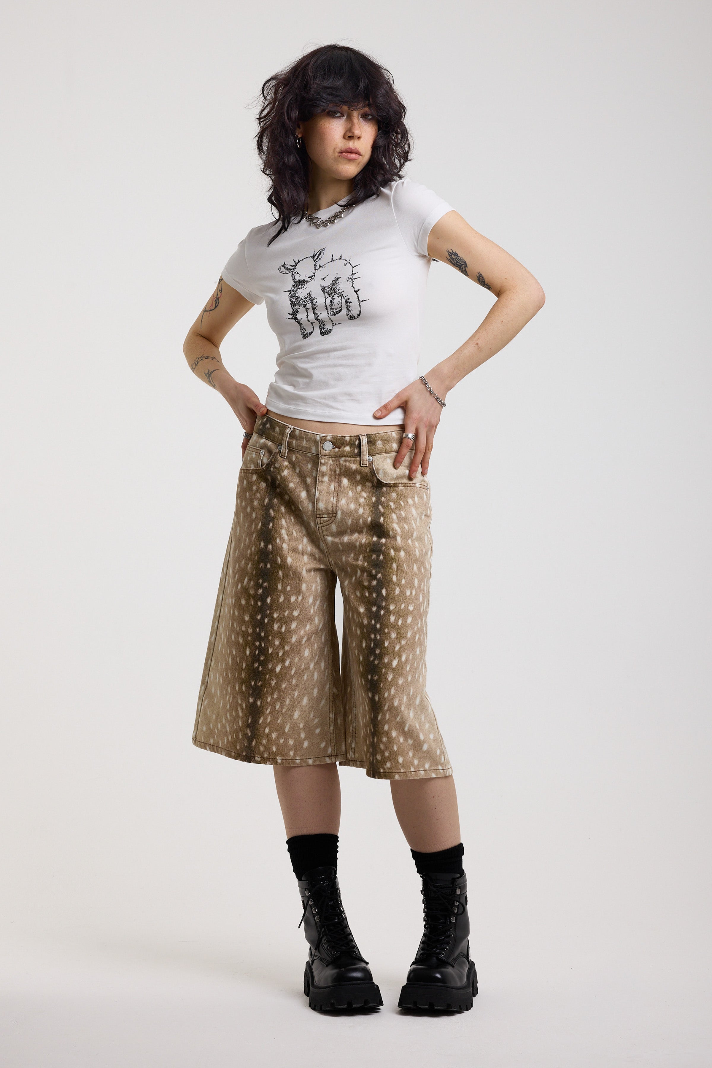 Baggy wide leg jorts in all over deer print, worn by model