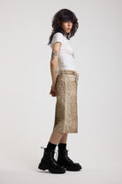 Baggy wide leg denim jorts in all over deer print, worn by model