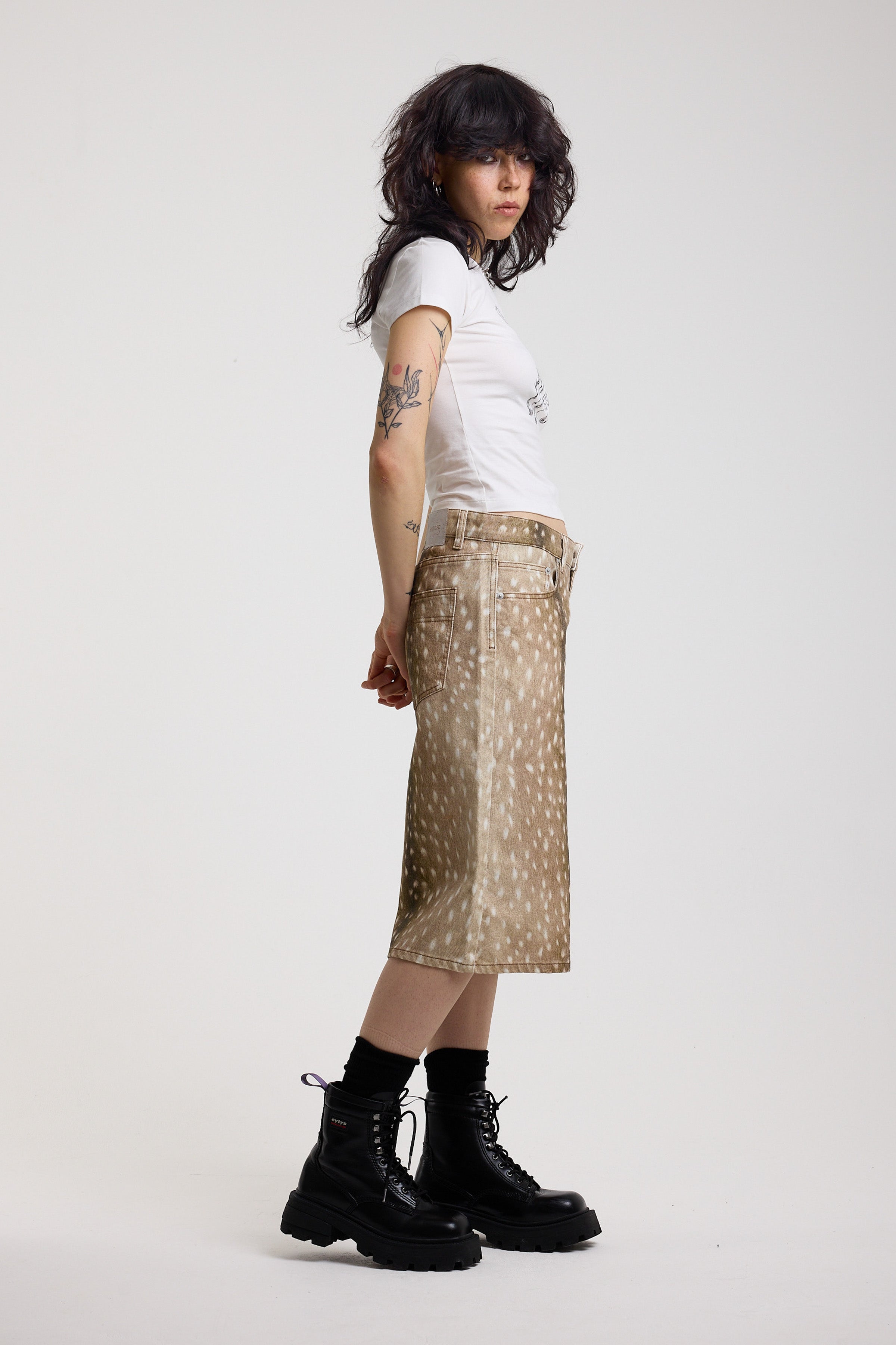 Baggy wide leg denim jorts in all over deer print, worn by model