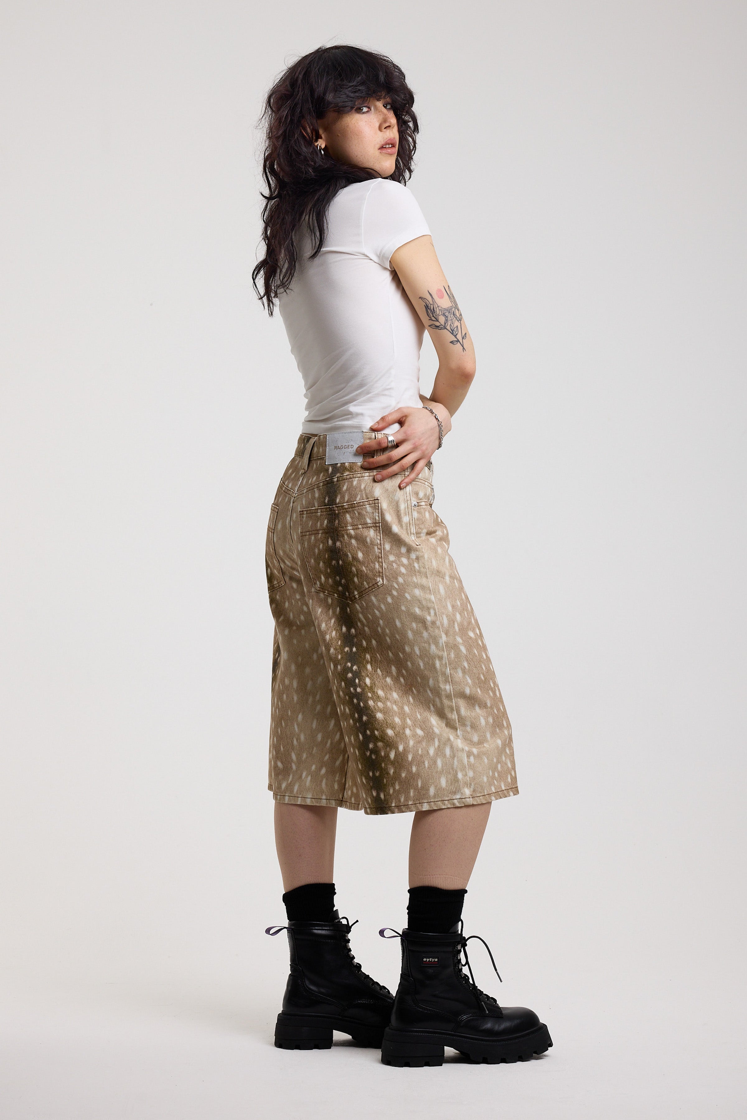 Baggy wide leg denim jorts in all over deer print, worn by model