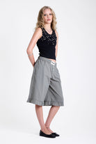 Green and yellow gingham longline boxer shorts, relaxed capri pants, with elasticated waistband and ruffle hem, worn by model