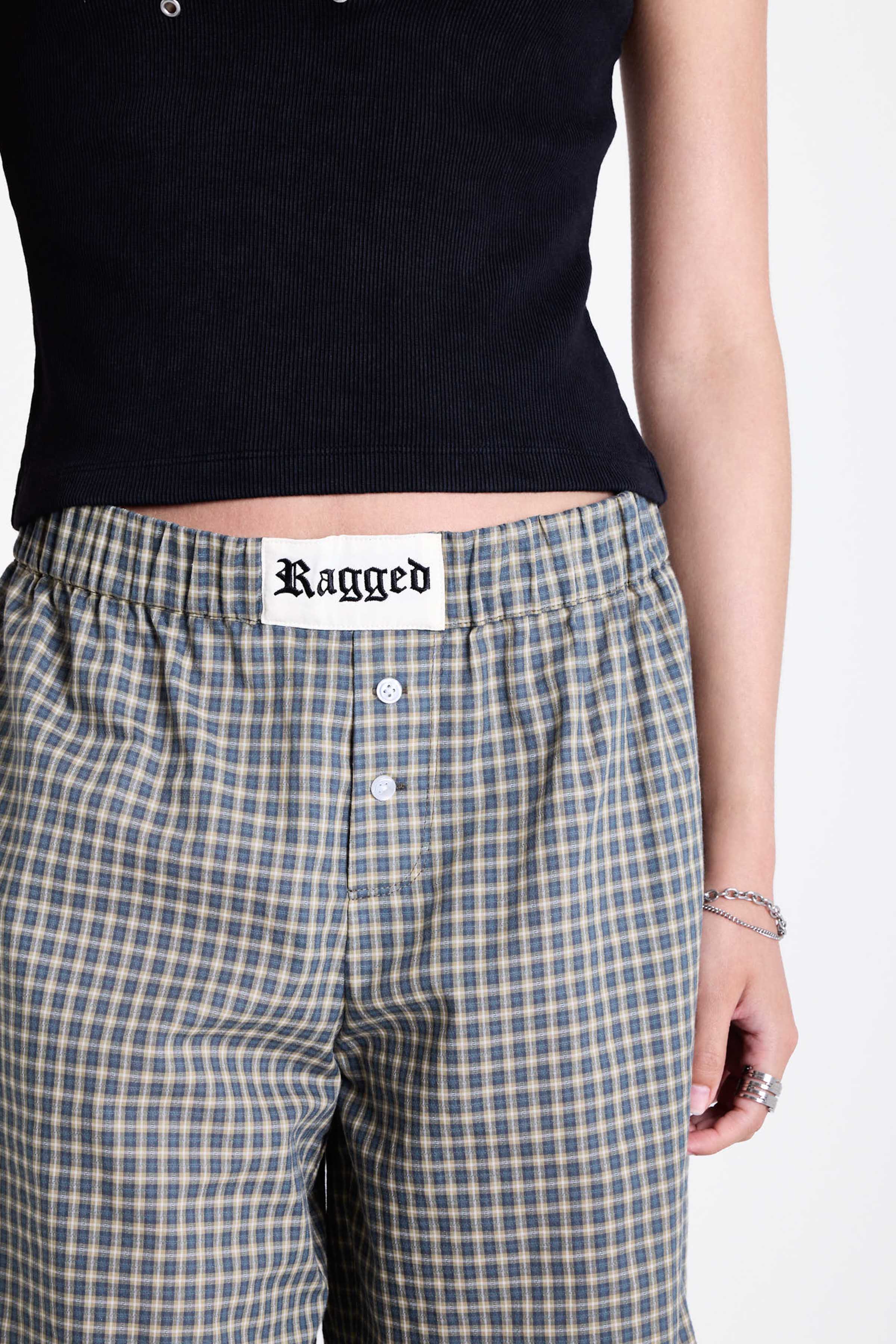 Green and yellow gingham longline boxer shorts, relaxed capri pants, with elasticated waistband and ruffle hem, worn by model