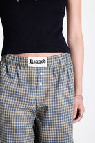 Green and yellow gingham longline boxer shorts, relaxed capri pants, with elasticated waistband and ruffle hem, worn by model