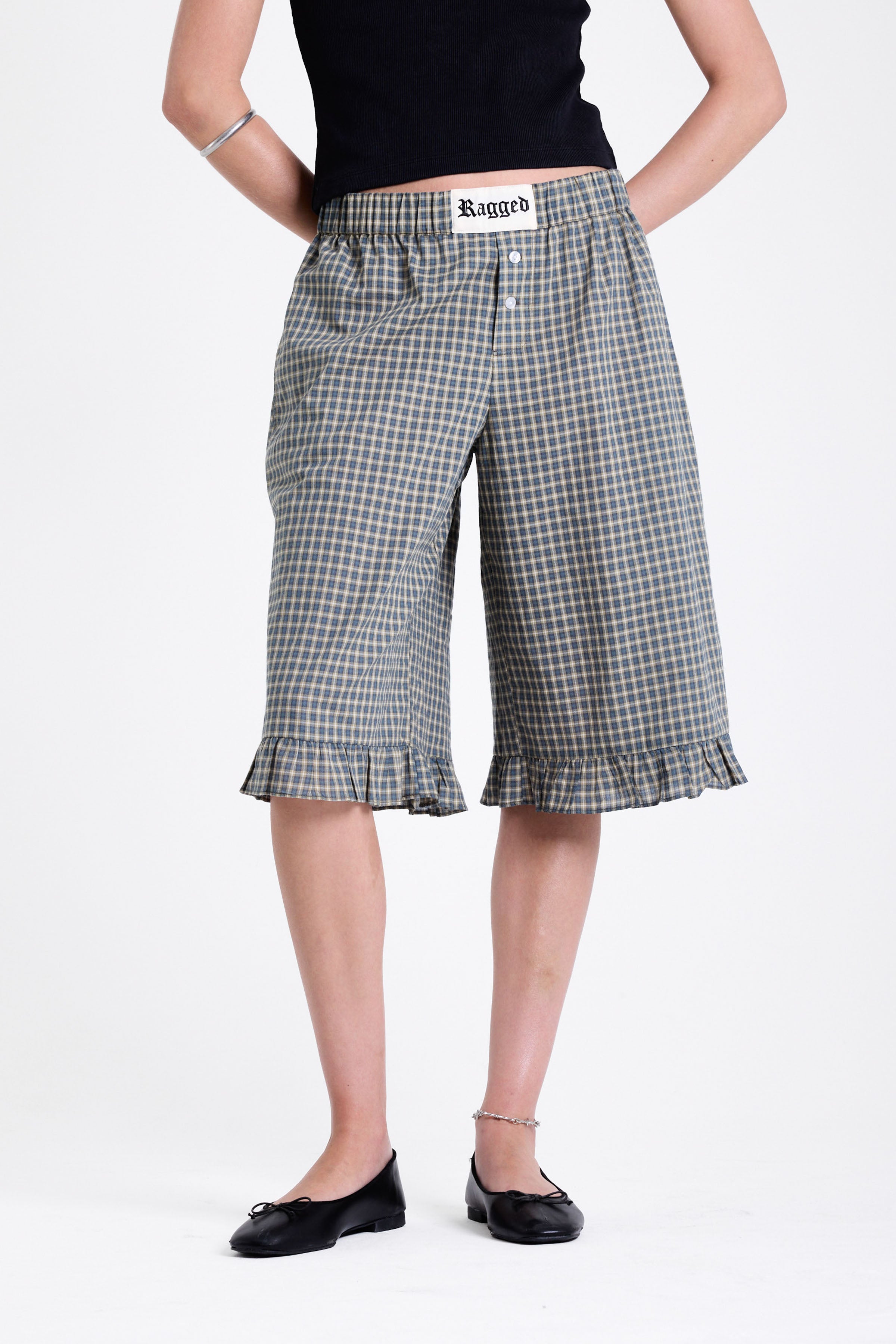 Green and yellow gingham longline boxer shorts, relaxed capri pants, with elasticated waistband and ruffle hem, worn by model